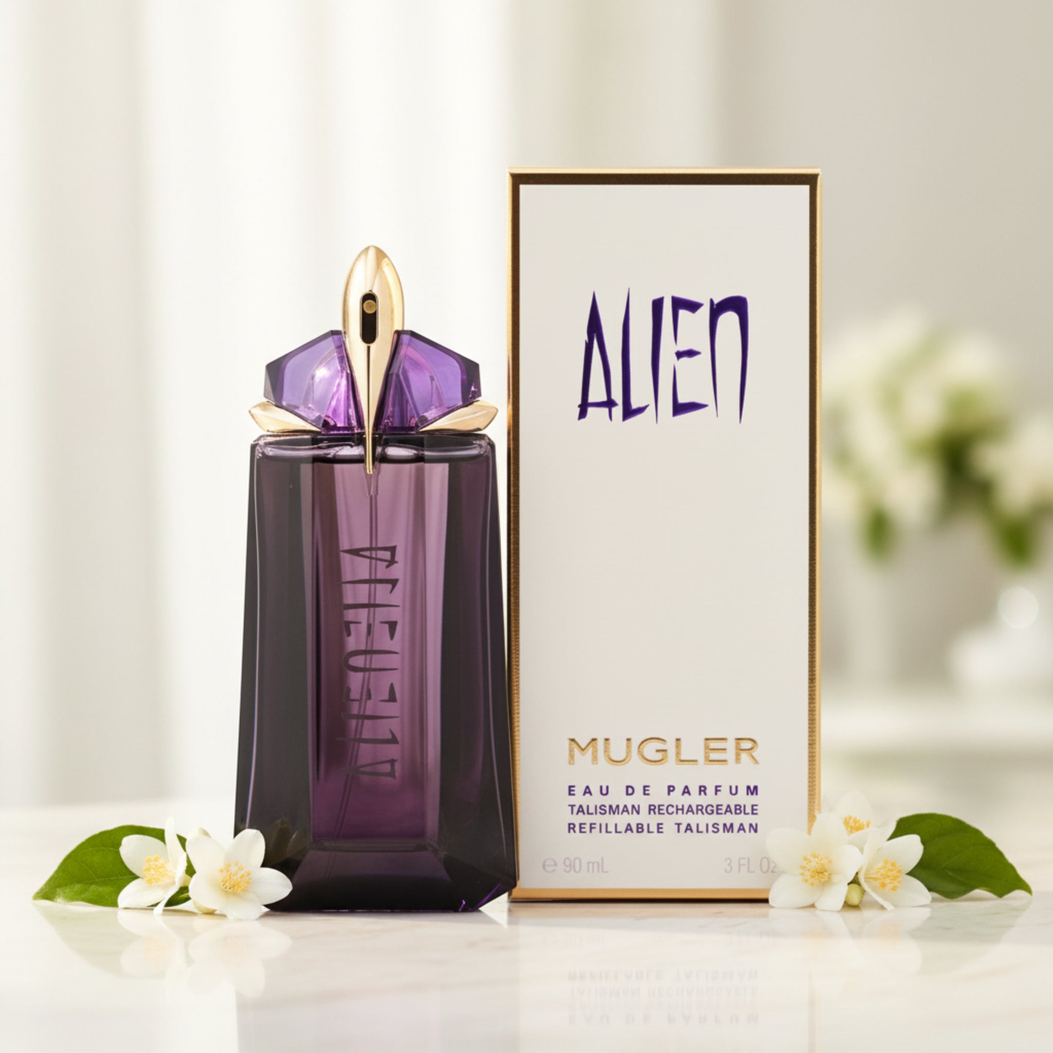 Mugler Alien perfume bottle and packaging on a white background