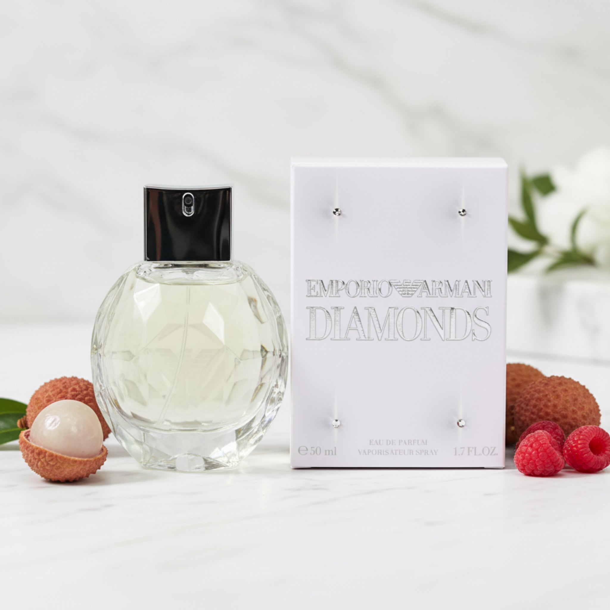 Emporio Armani Diamonds perfume bottle and packaging on a white background