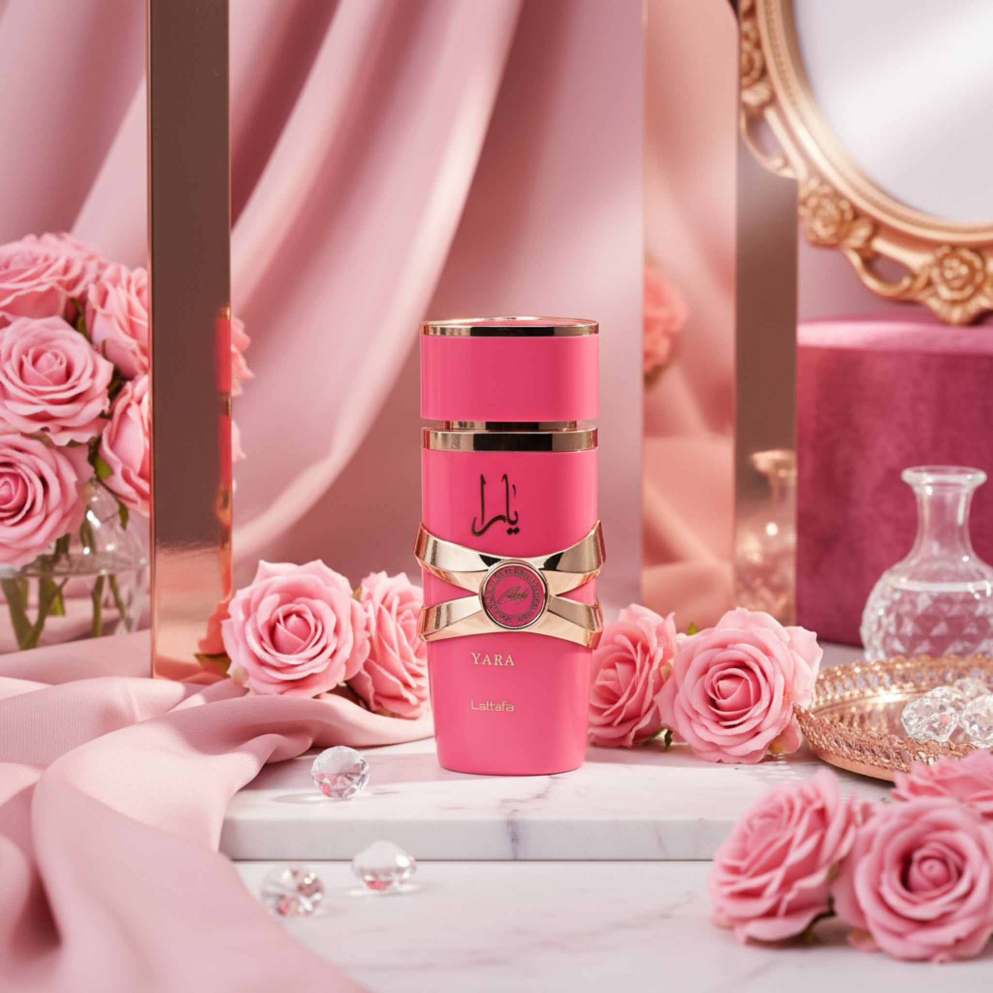 Pink and gold perfume bottle with 'Yara' branding on a white background