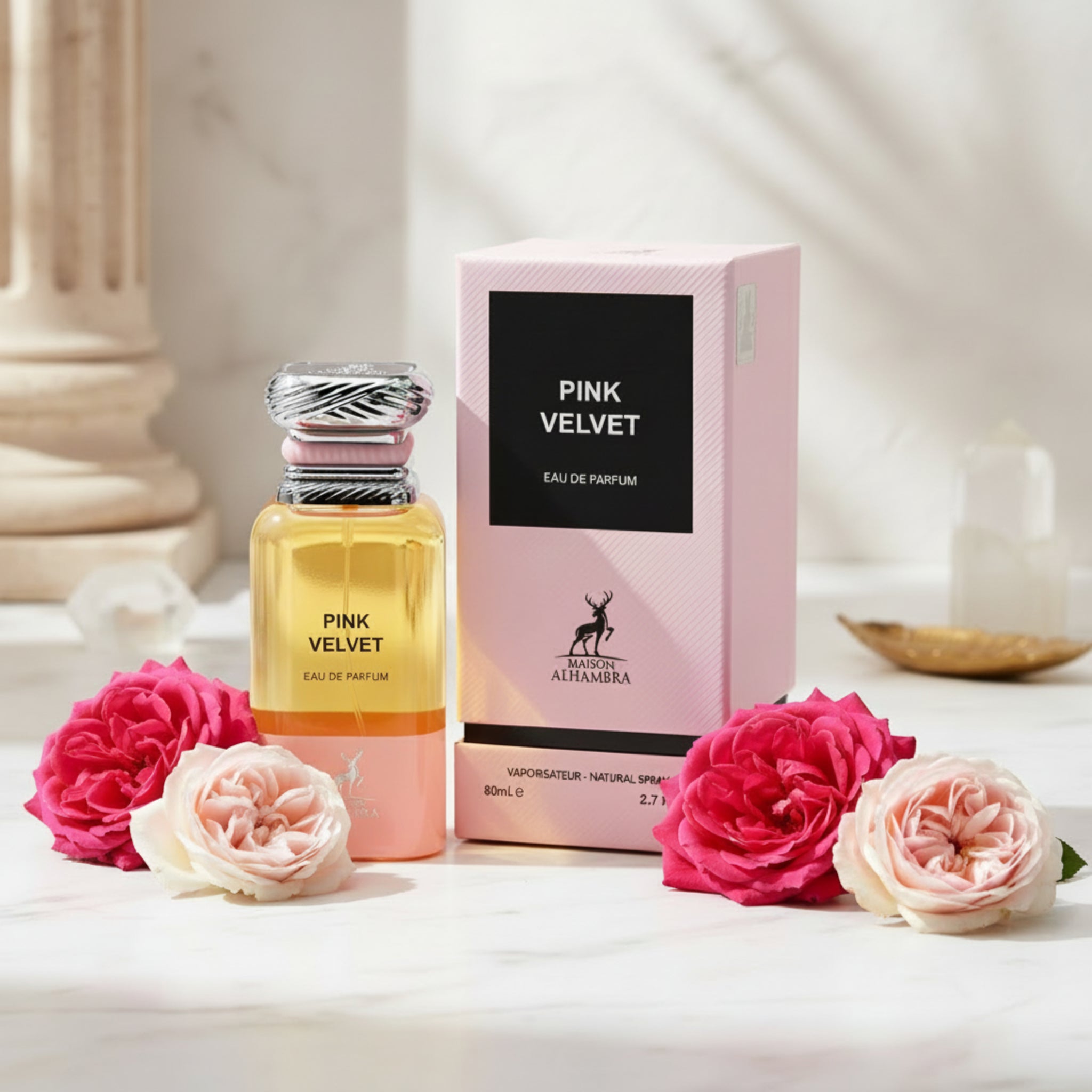 Pink Velvet eau de parfum bottle and packaging on a white background