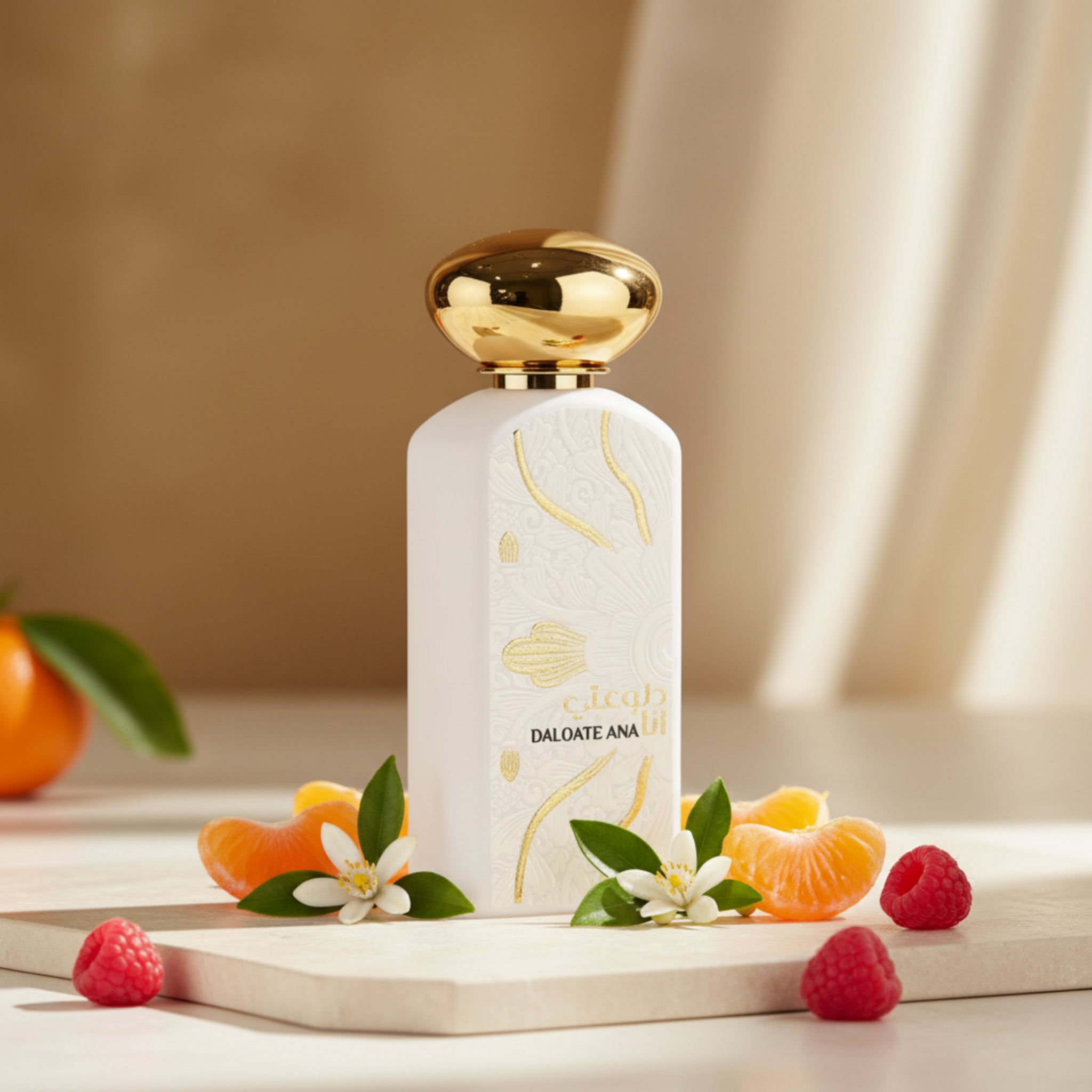 Perfume bottle with gold cap and decorative design on a white background