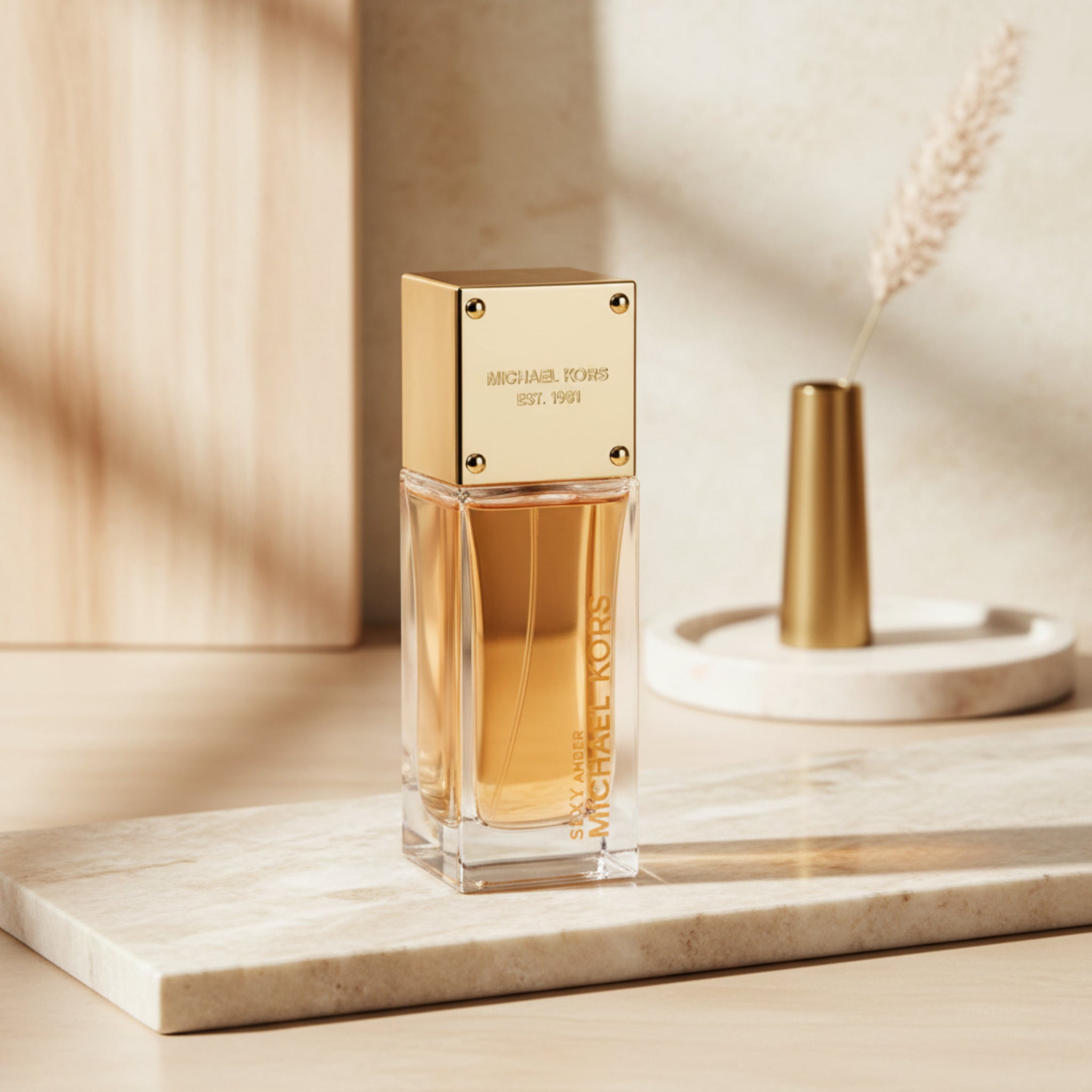 Michael Kors perfume bottle on a white background