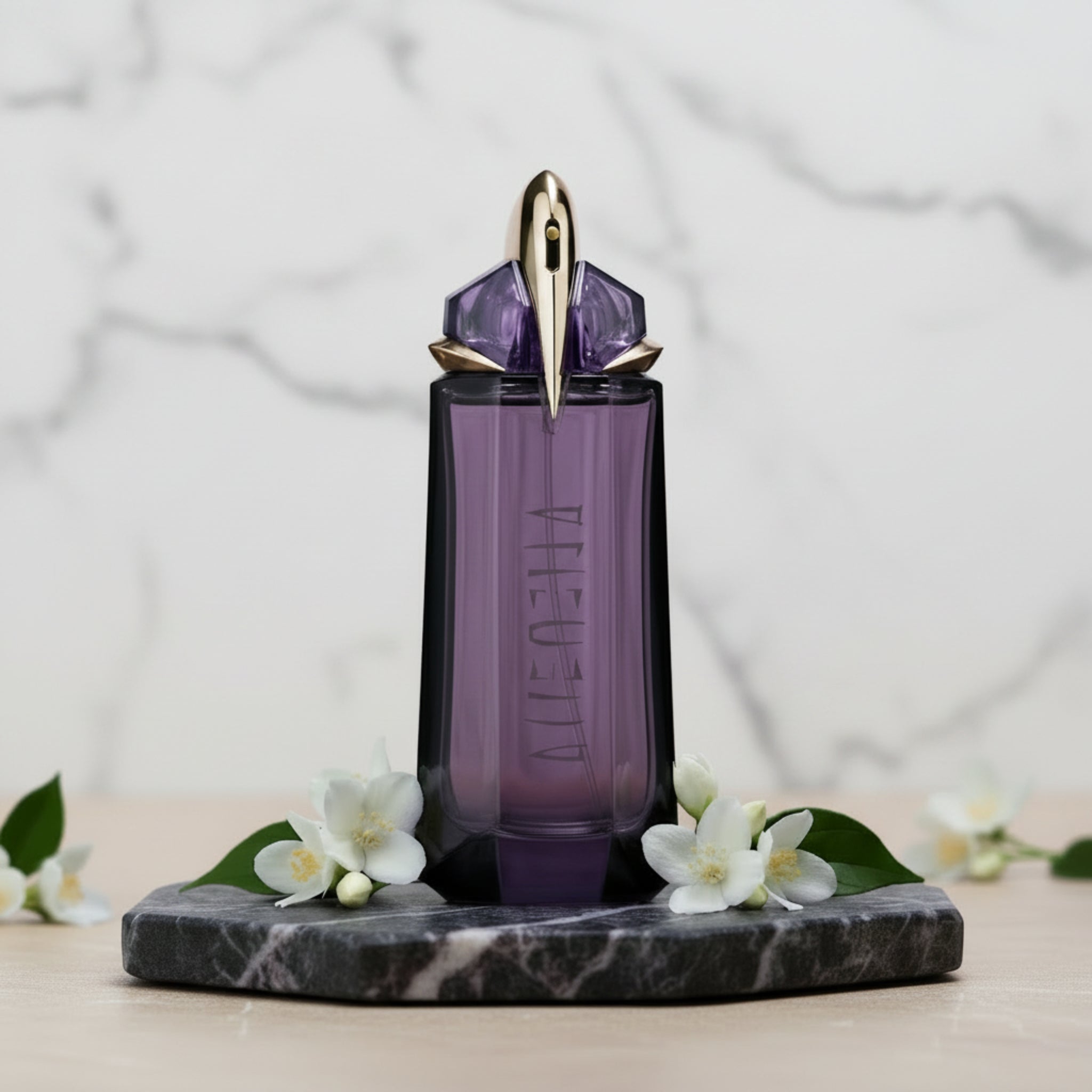 Purple perfume bottle with a gold cap on a white background