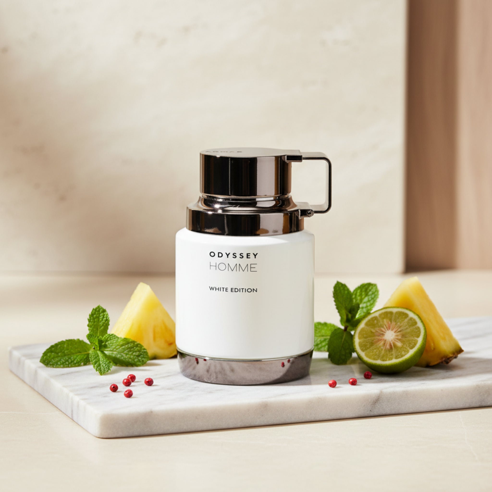 White bottle with silver cap labeled 'Odyssey Homme White Edition' on a white background