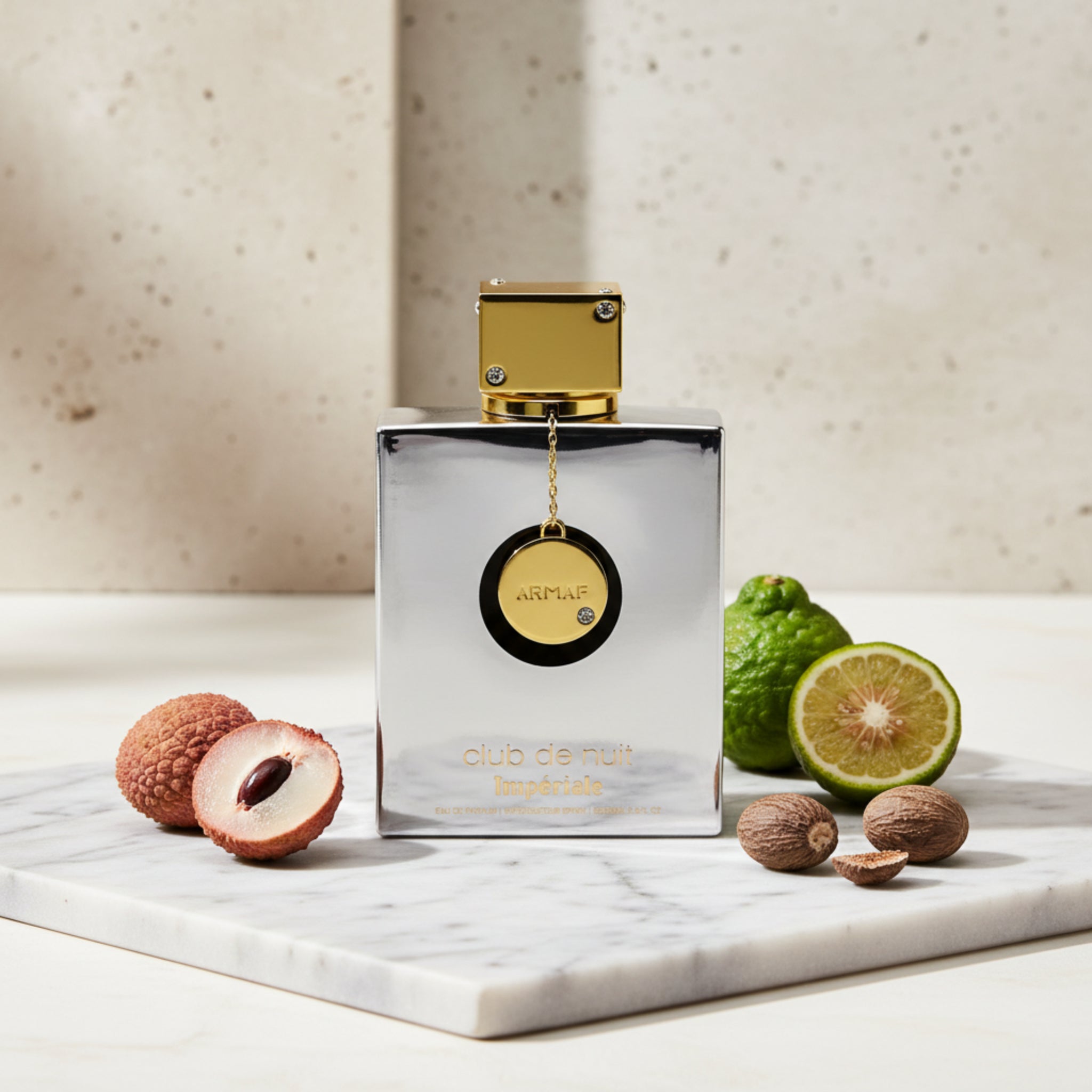 Perfume bottle with gold cap and label on a white background