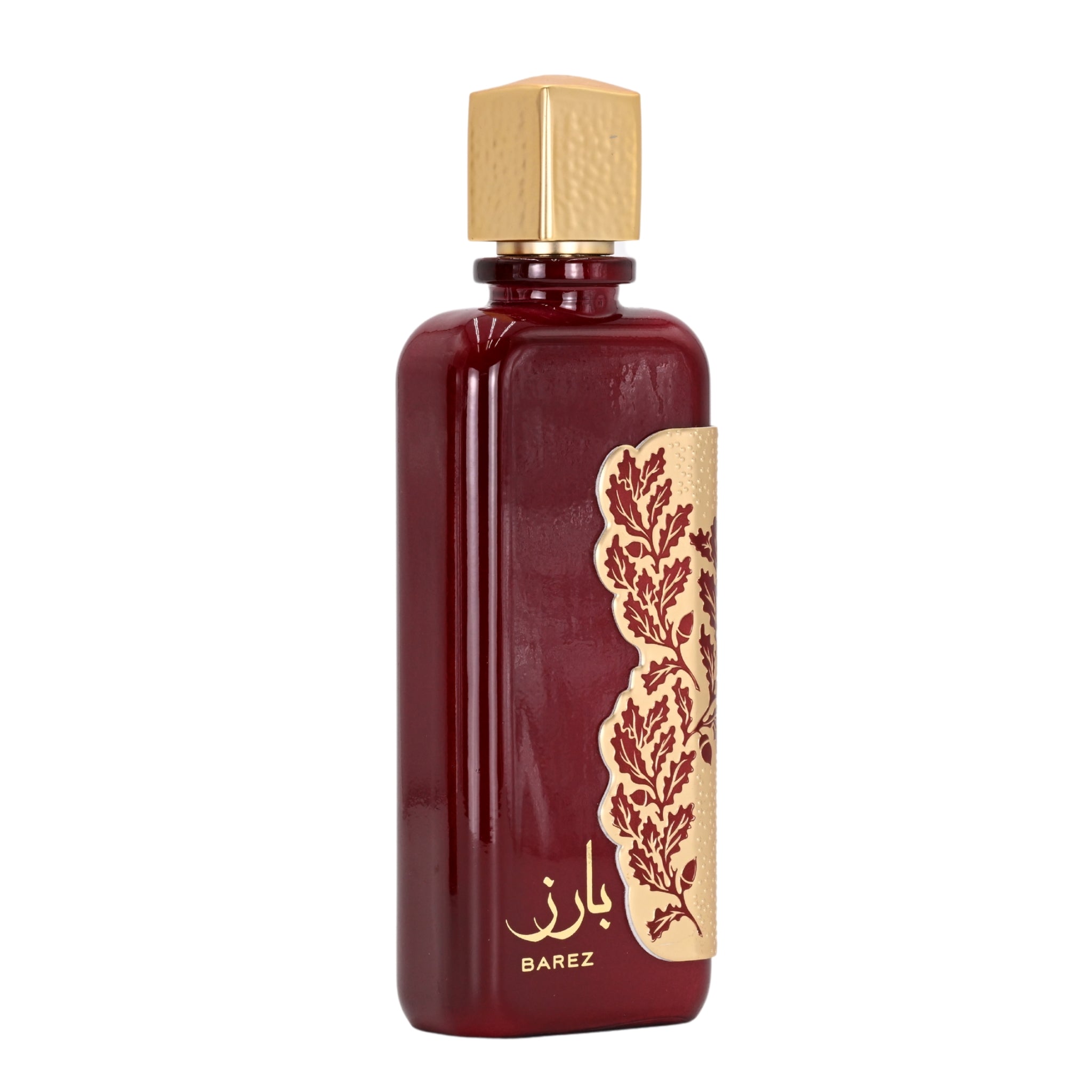 Red perfume bottle with gold cap and intricate design on a white background