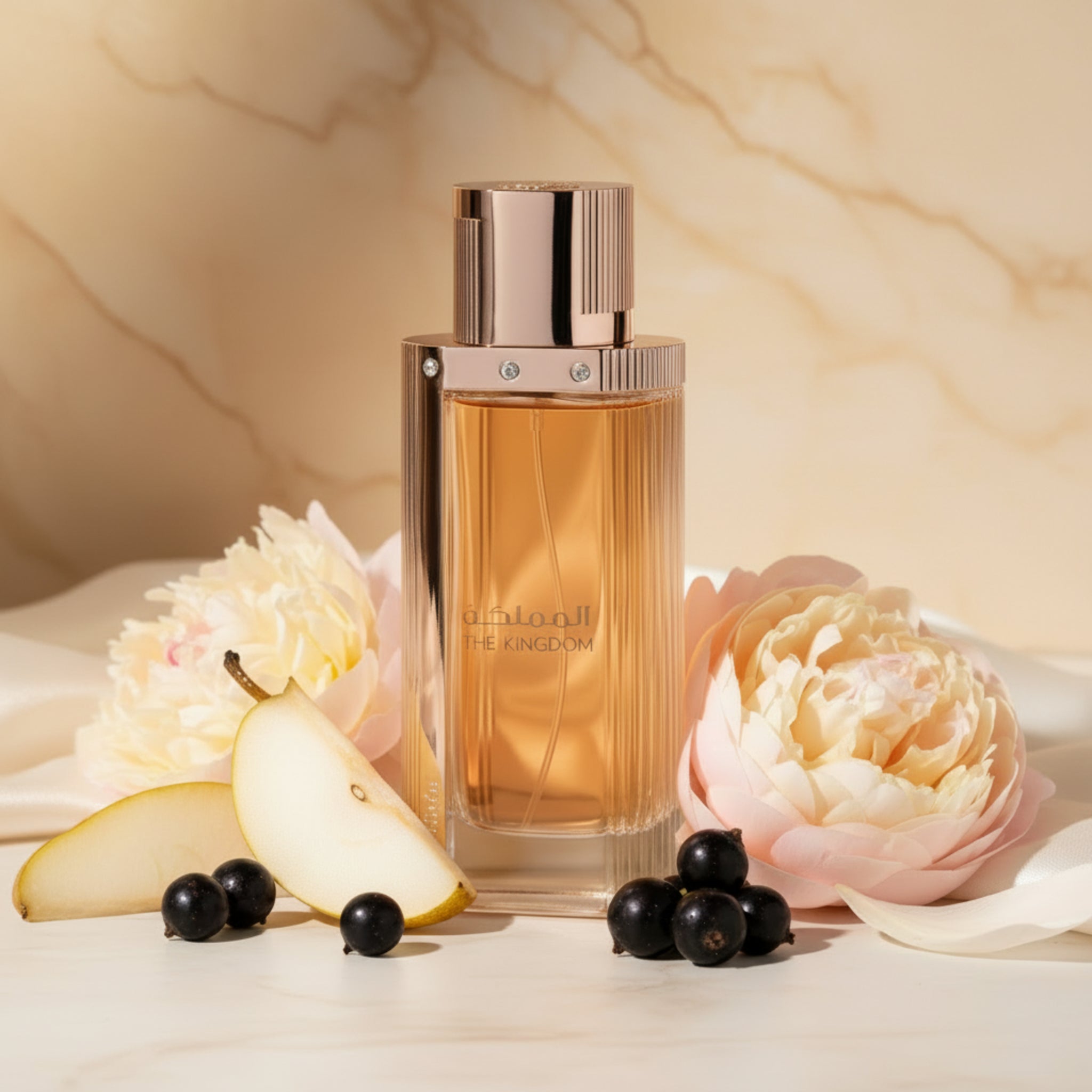 Perfume bottle with gold cap and clear body on a white background