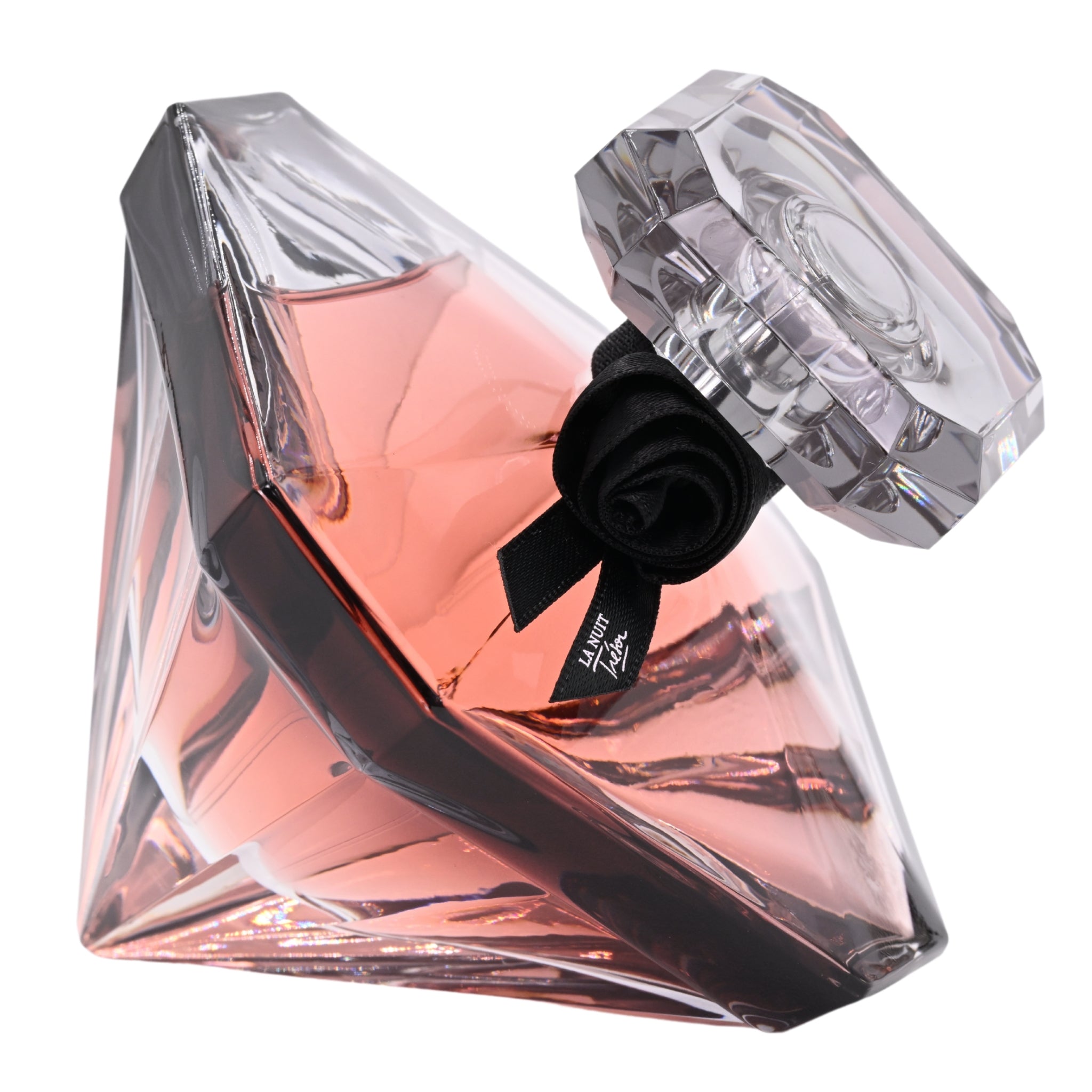 Diamond-shaped perfume bottle with a black rose on a white background