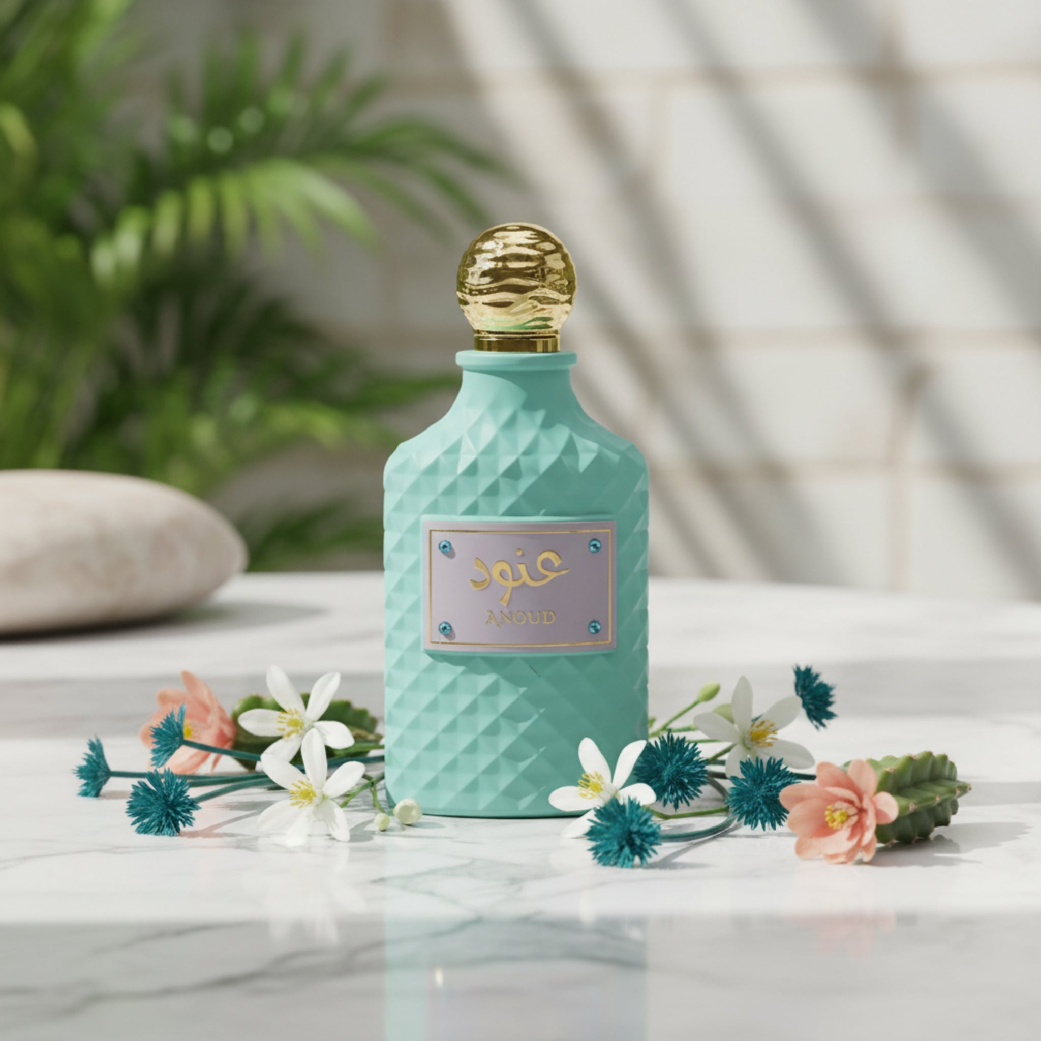 Mint green perfume bottle with gold cap on a white background