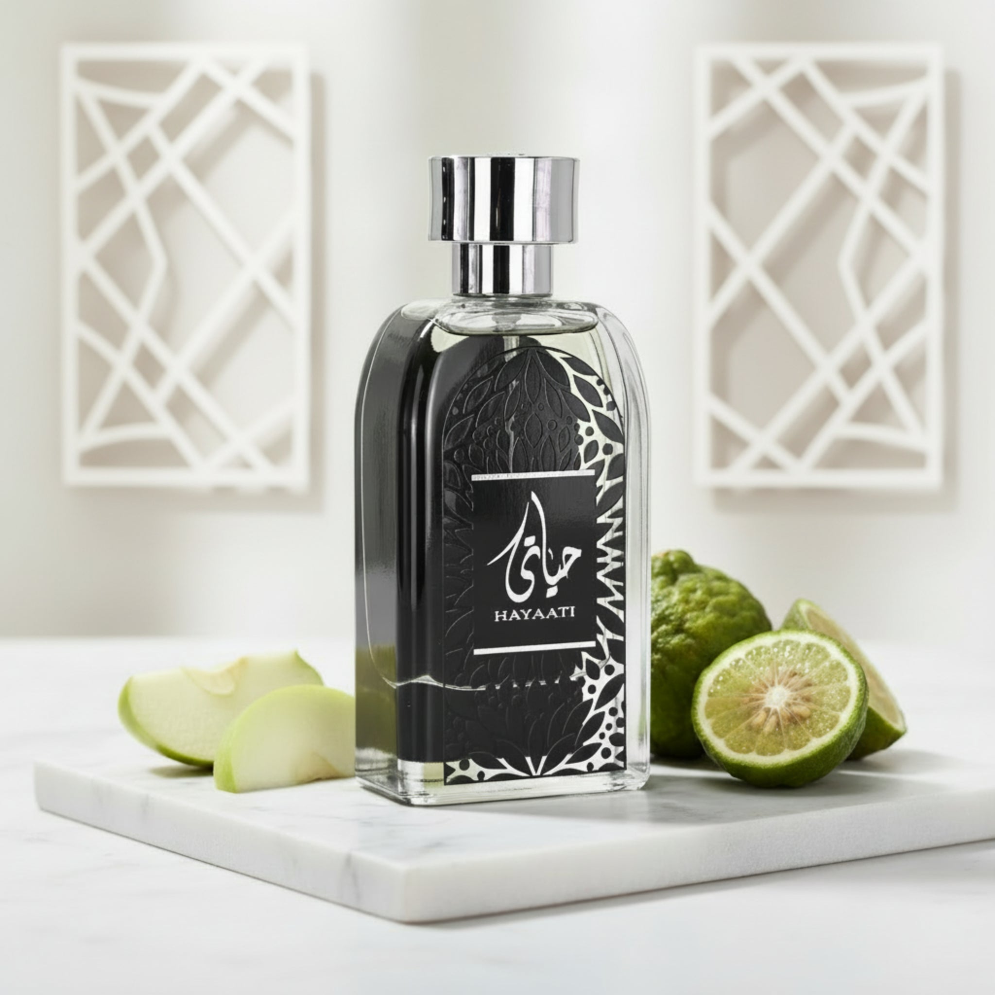 Perfume bottle with black label and silver cap on a white background