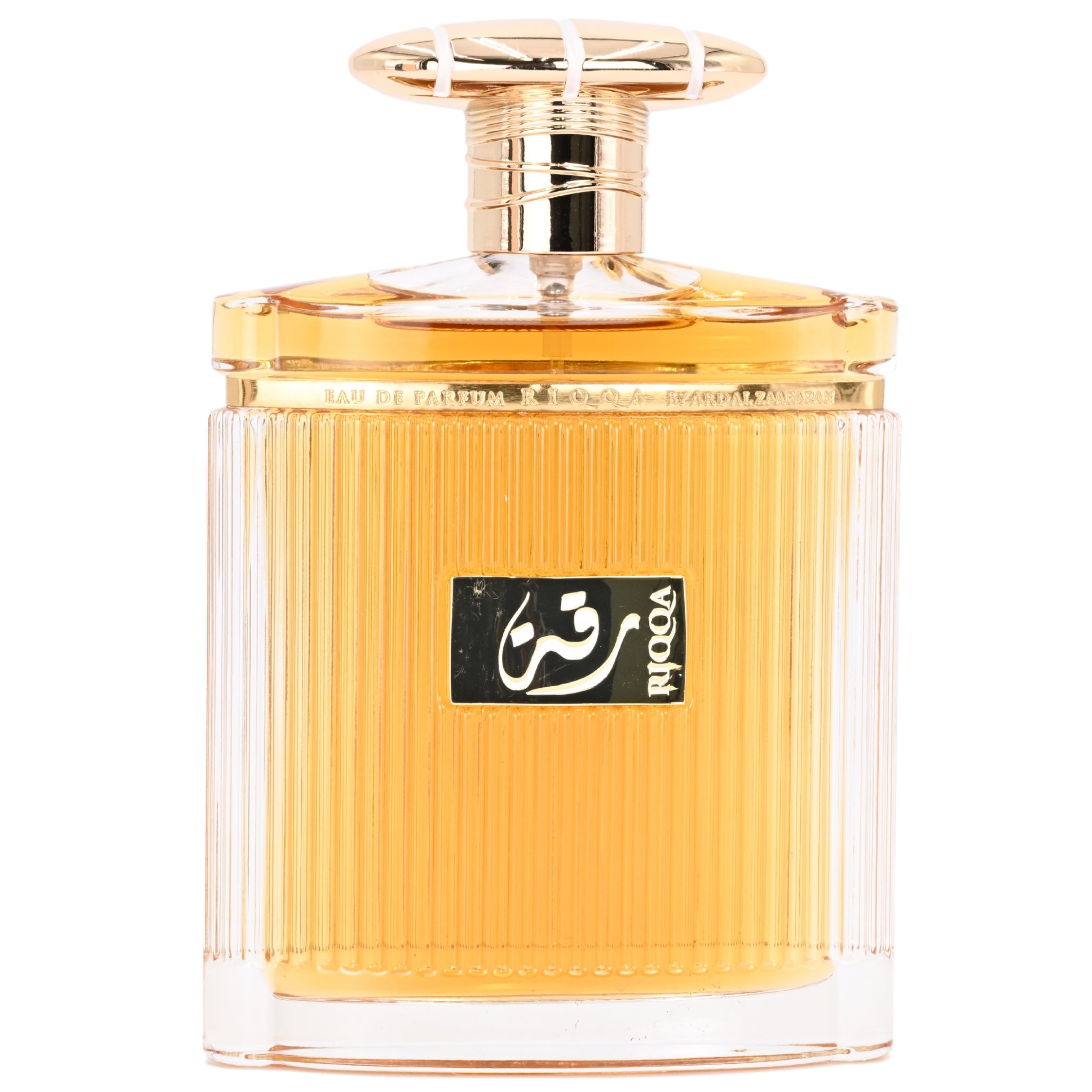 Perfume bottle with gold cap and clear body on a white background