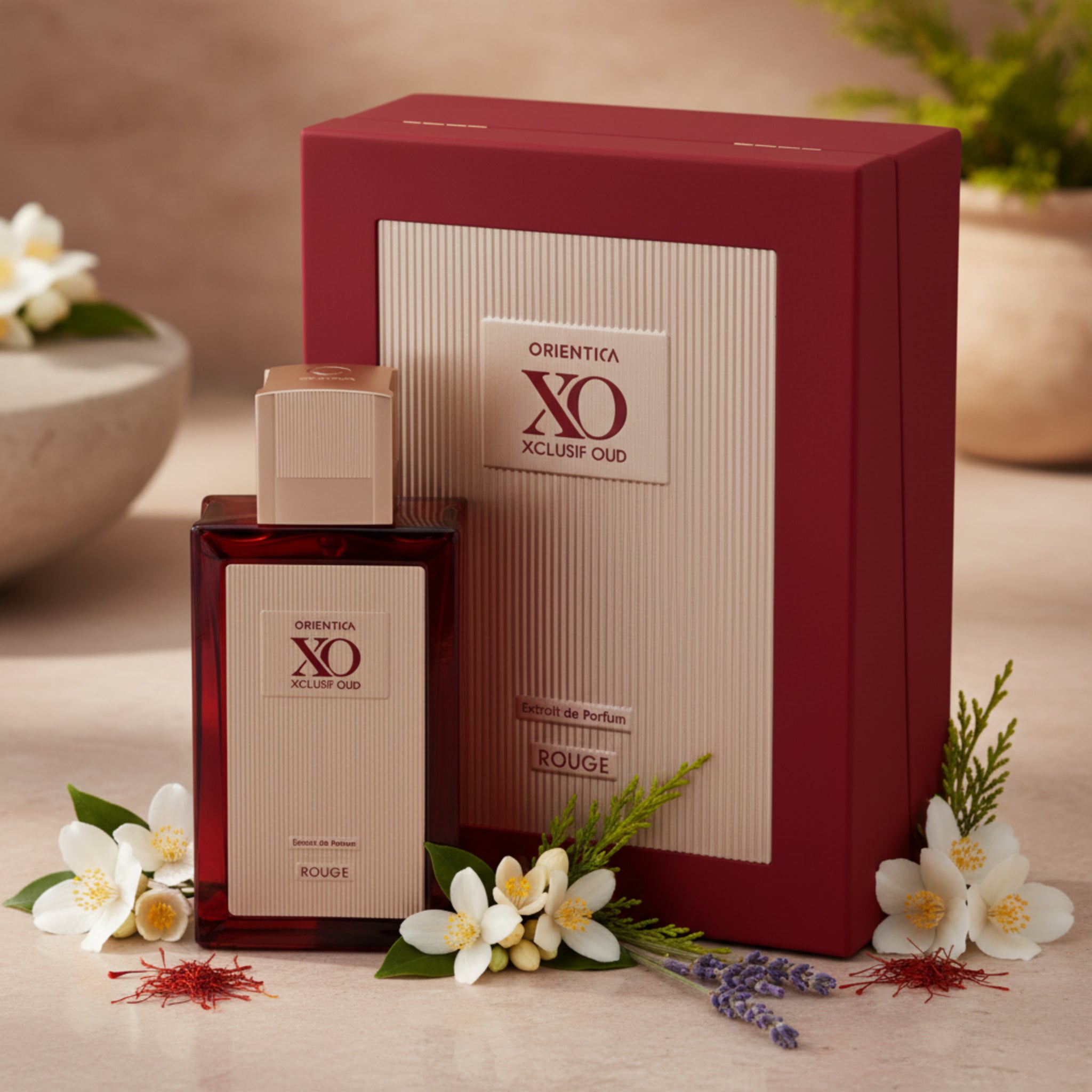 Orientica XO Xclusif Oud perfume bottle and packaging on a white background