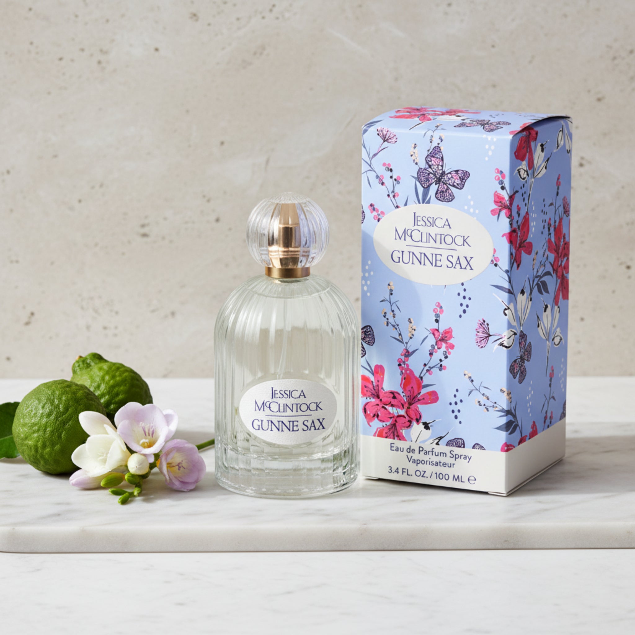 Jessica McClintock Gunne Sax perfume bottle and packaging with floral design