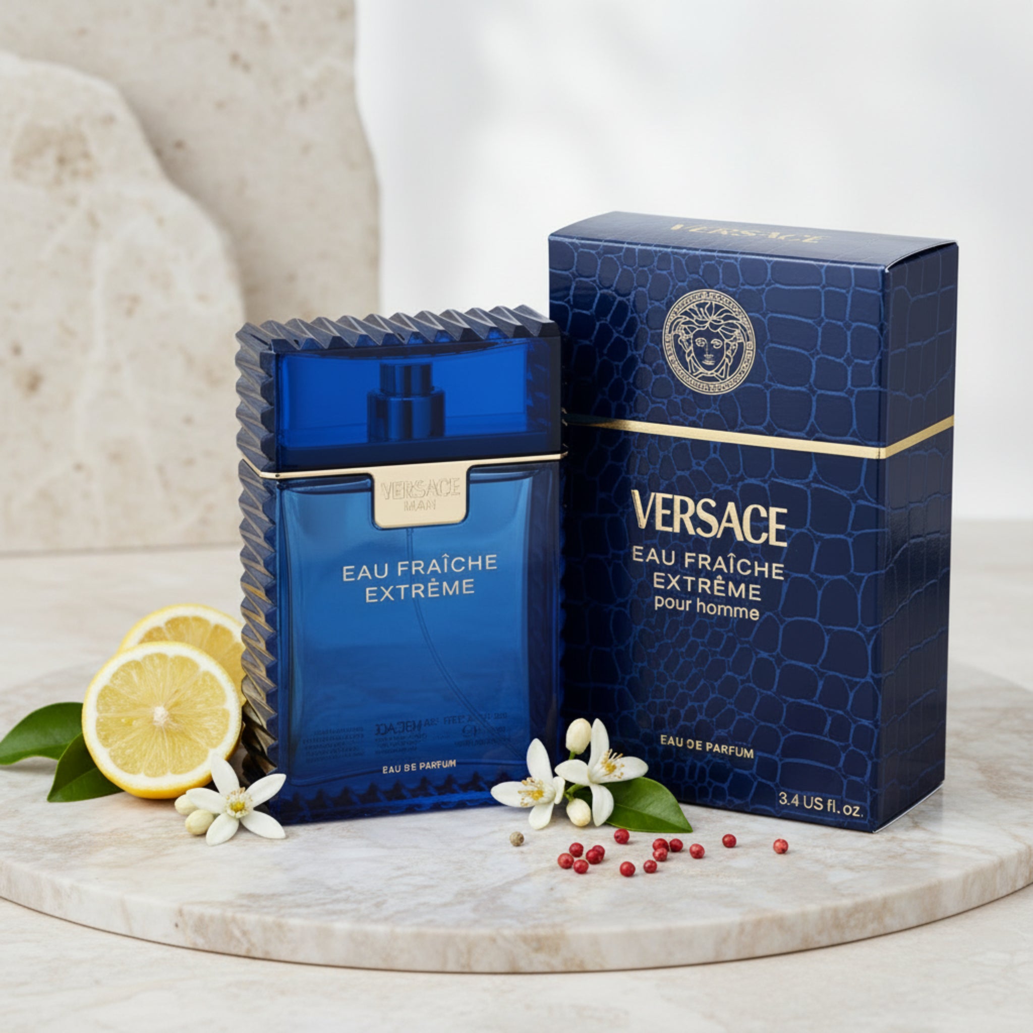 Versace Eau Fraçéche Extèreme perfume bottle and packaging on a white background