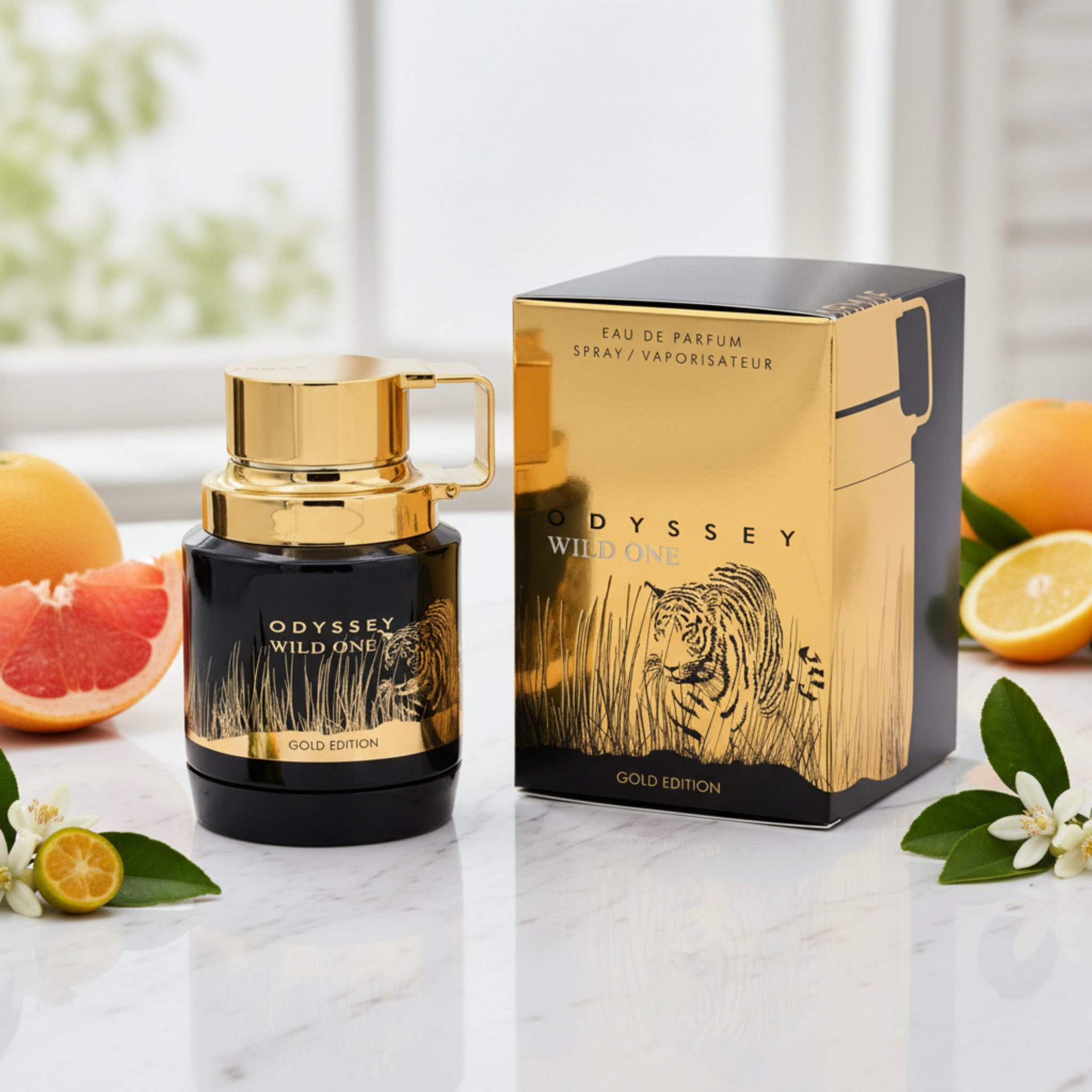 Odyssey Wild One Gold Edition perfume bottle and packaging with tiger illustration.