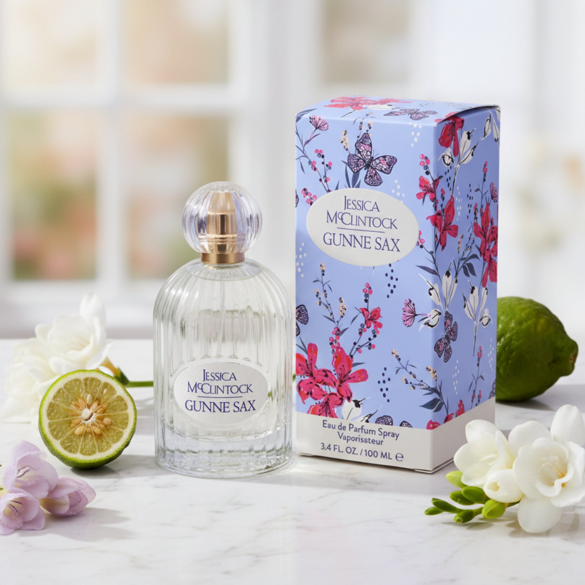 Jessica McClintock Gunne Sax perfume bottle and packaging with floral design