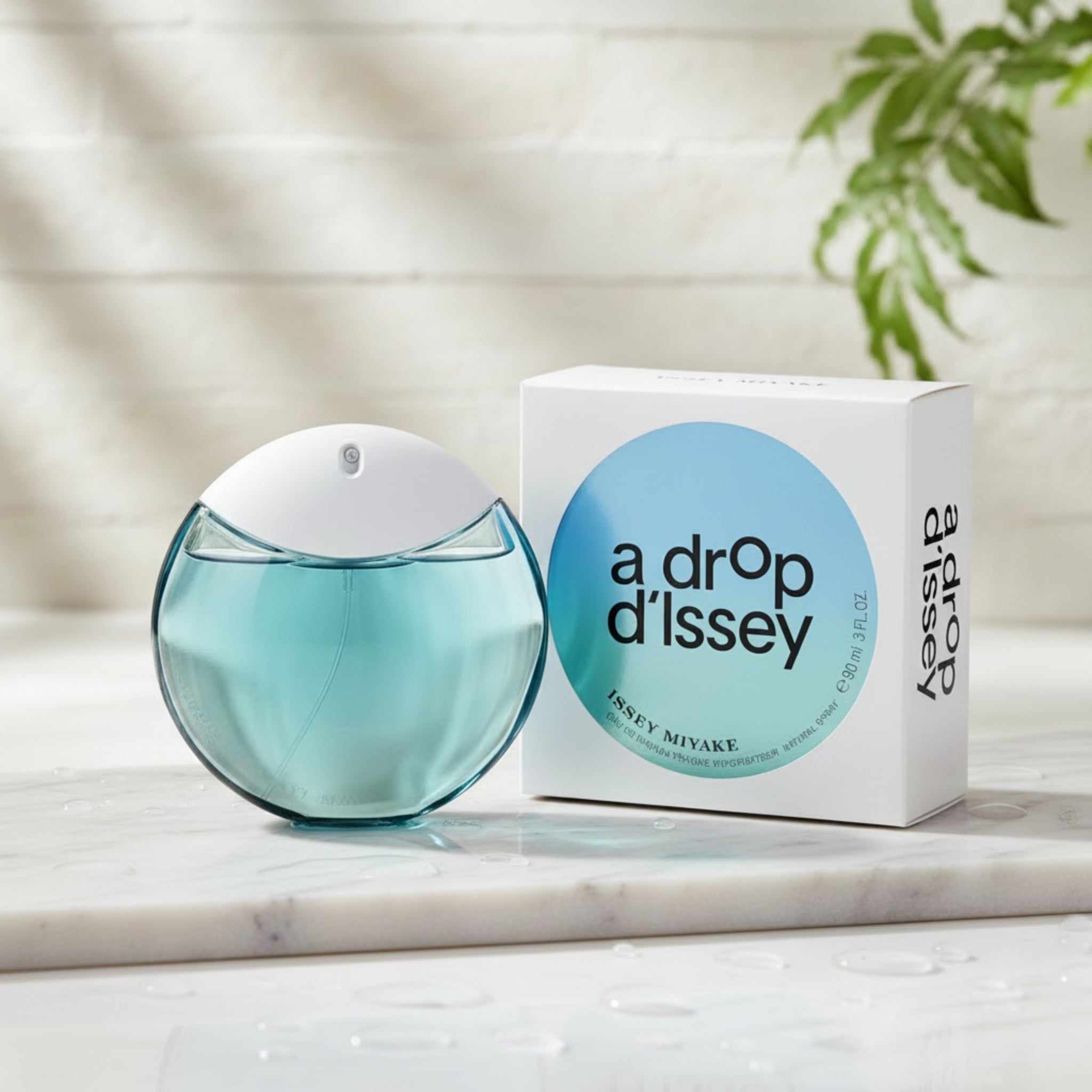 Issey Miyake 'A Drop d'Issey' perfume bottle and packaging on a white background