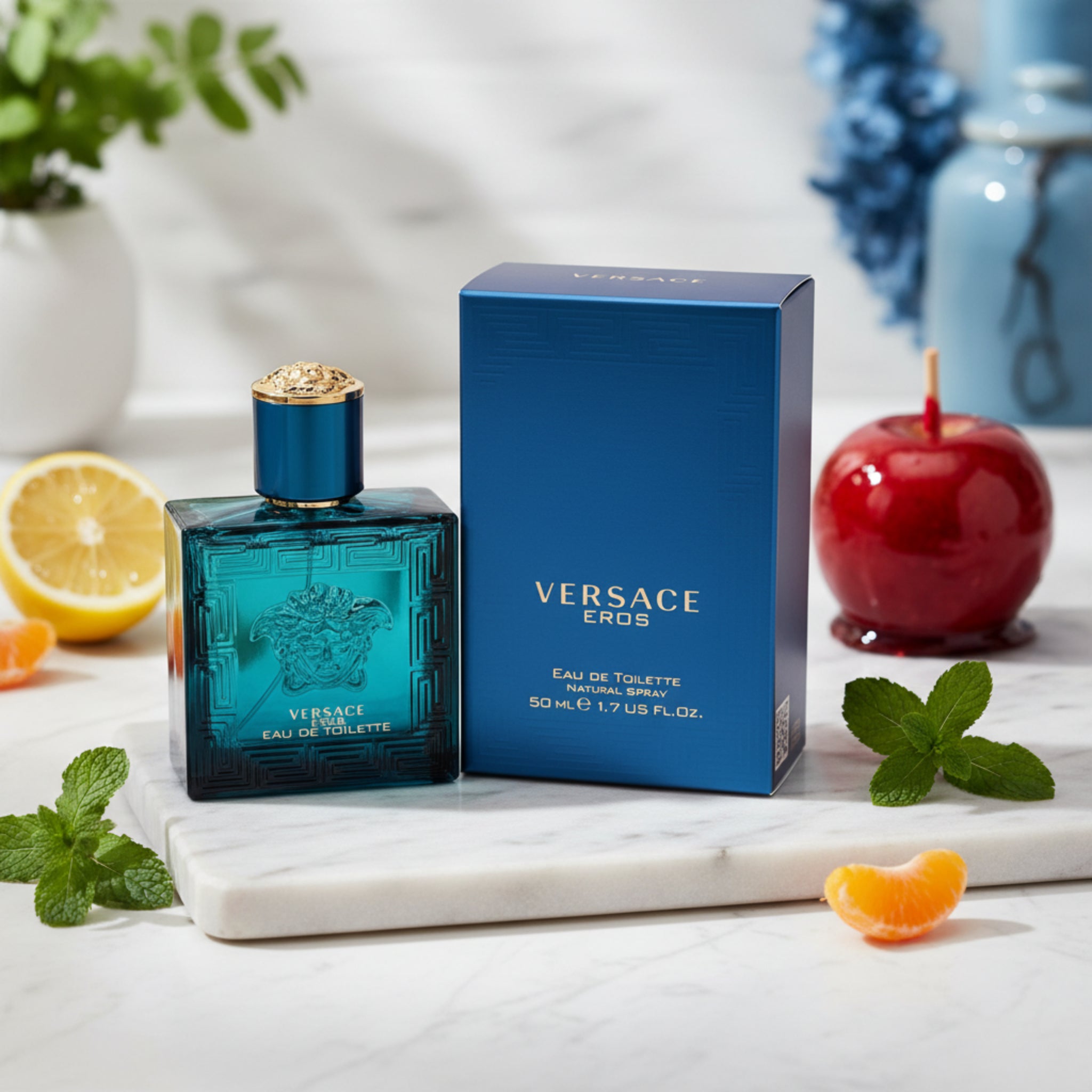 Versace Eros perfume bottle and packaging on a white background