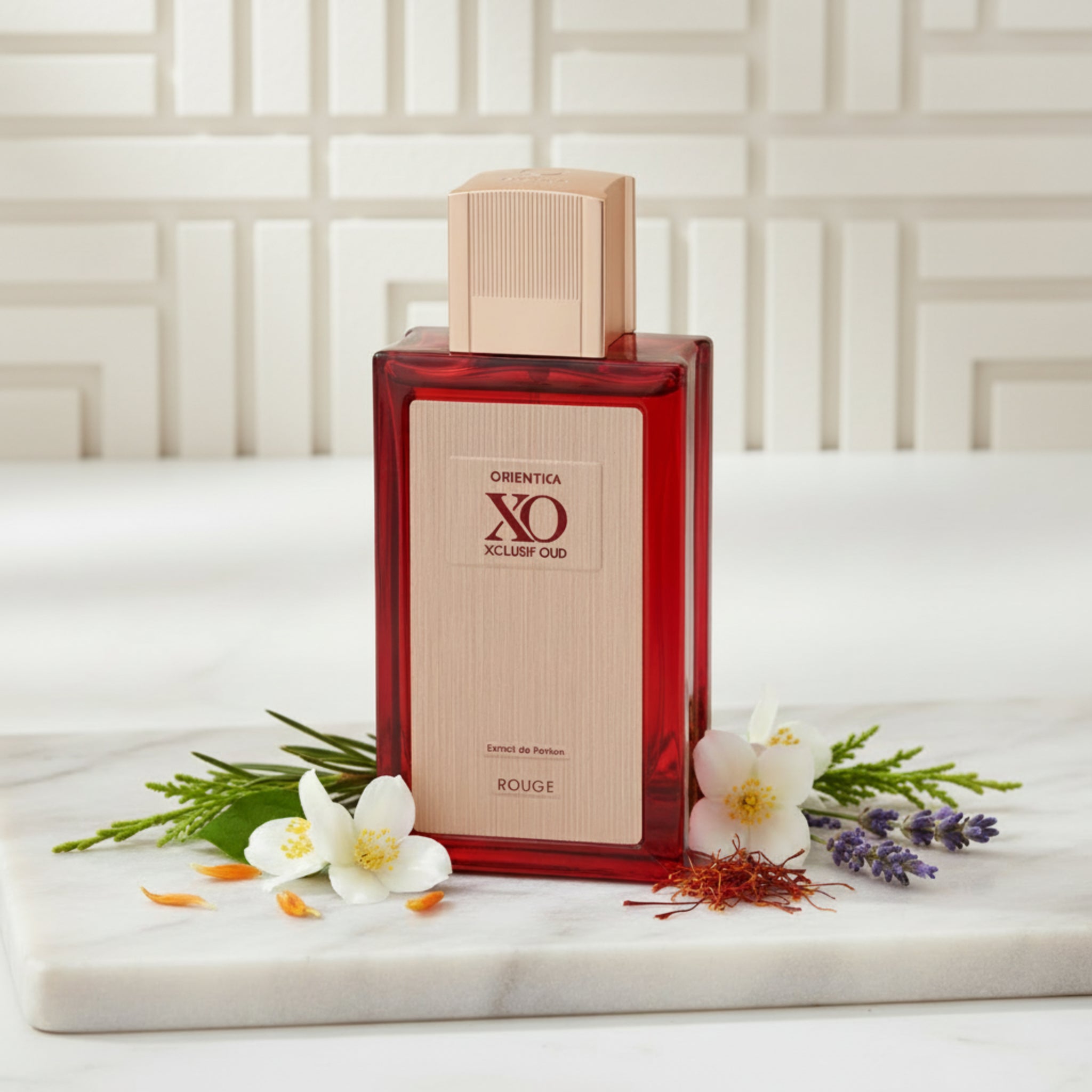 Perfume bottle with red and beige design on a white background