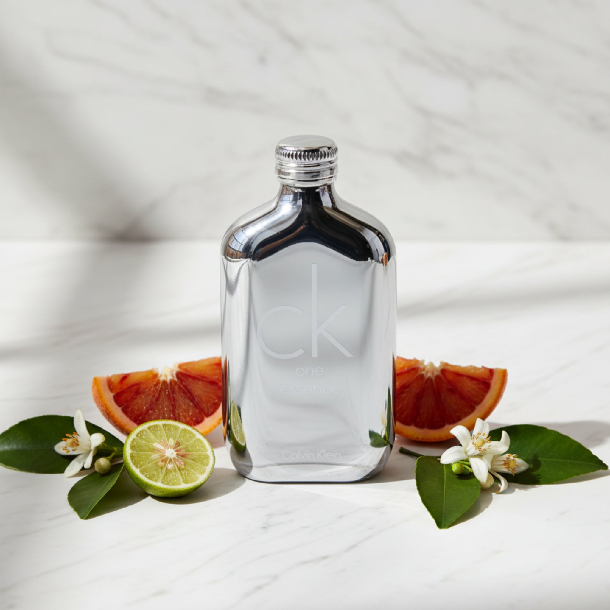 Silver Calvin Klein perfume bottle on a white background