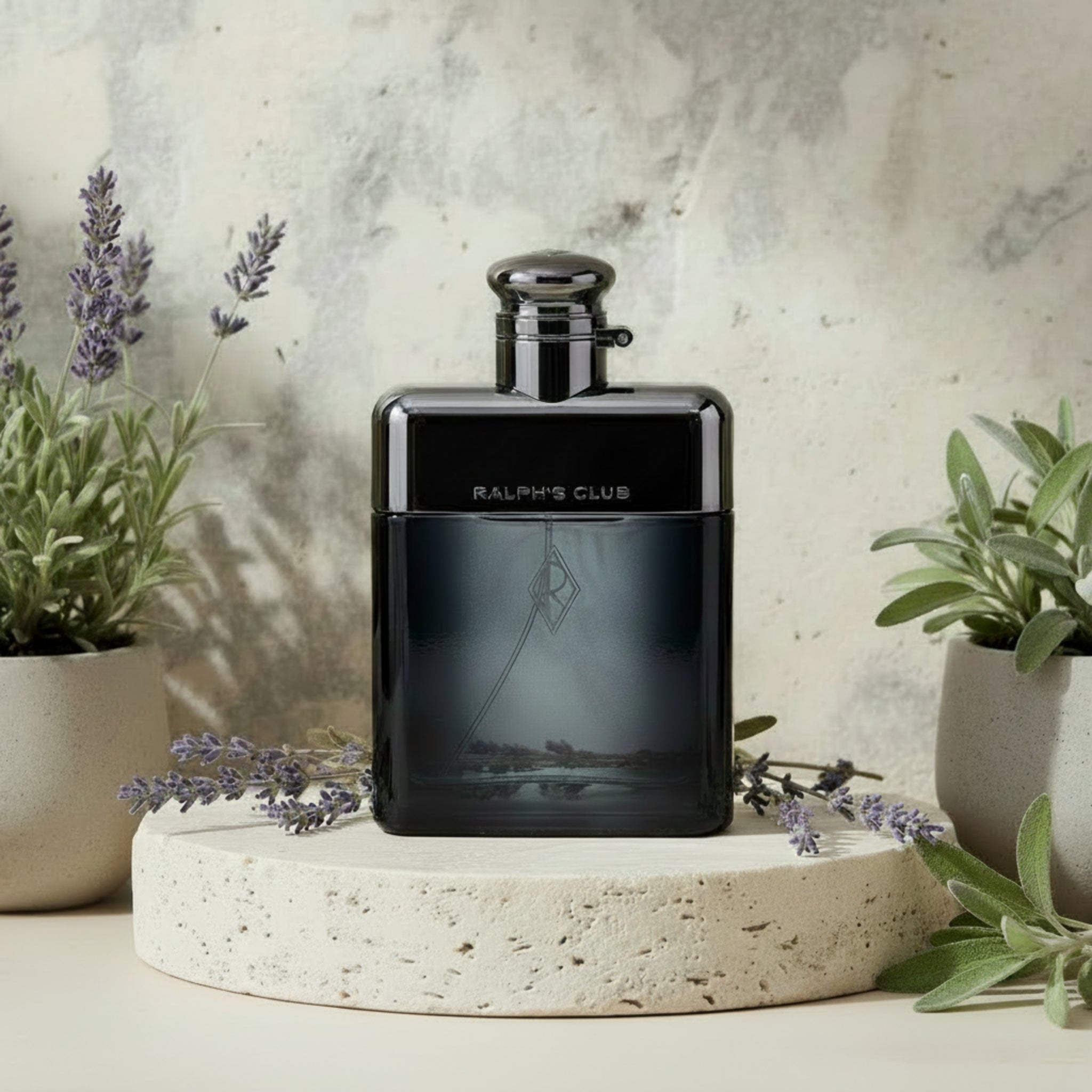 Ralph's Club perfume bottle with silver cap on a white background