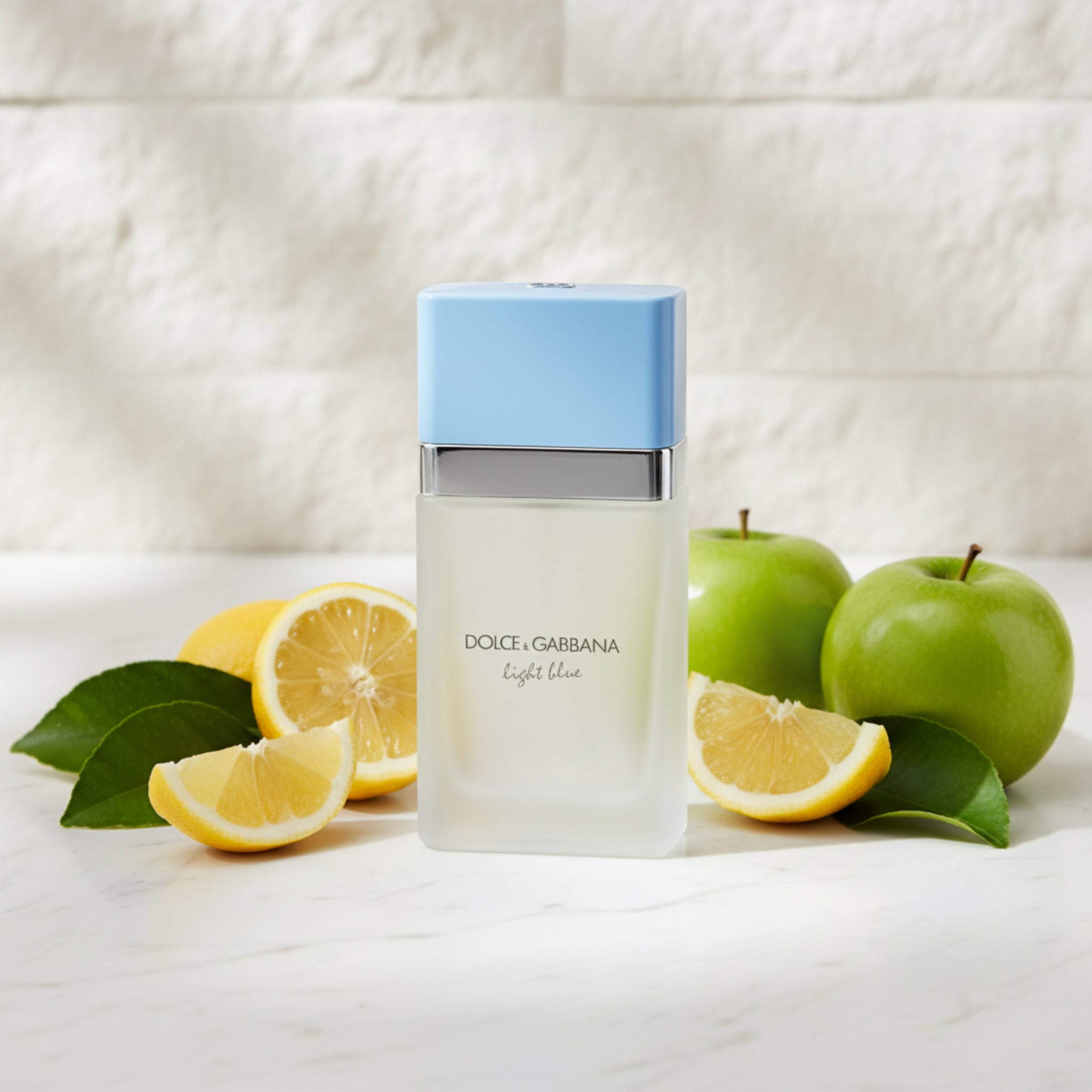 Dolce & Gabbana Light Blue perfume bottle with blue cap on a white background