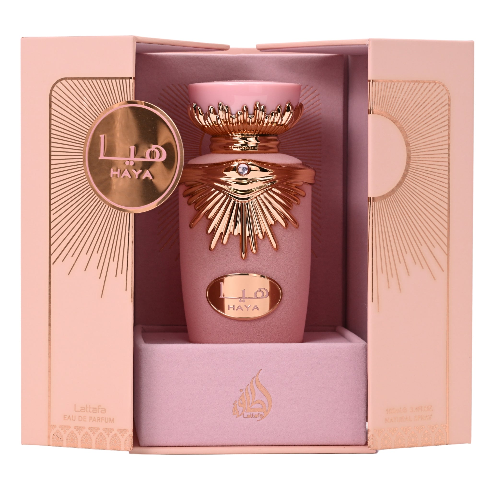 Pink perfume bottle with gold accents in a decorative box, featuring the brand 'Haya'.