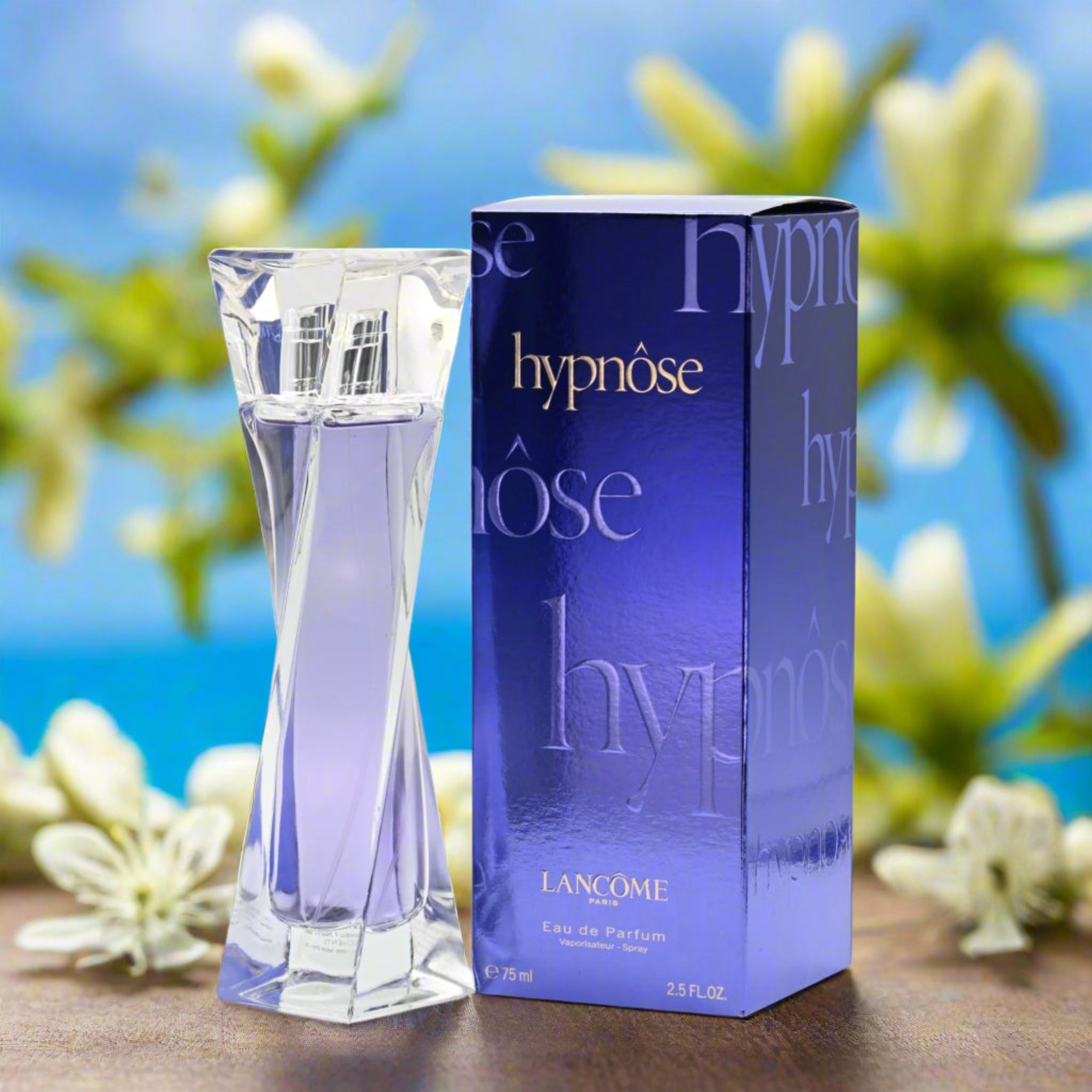 Lancème Hypnôse perfume bottle and packaging with a floral background