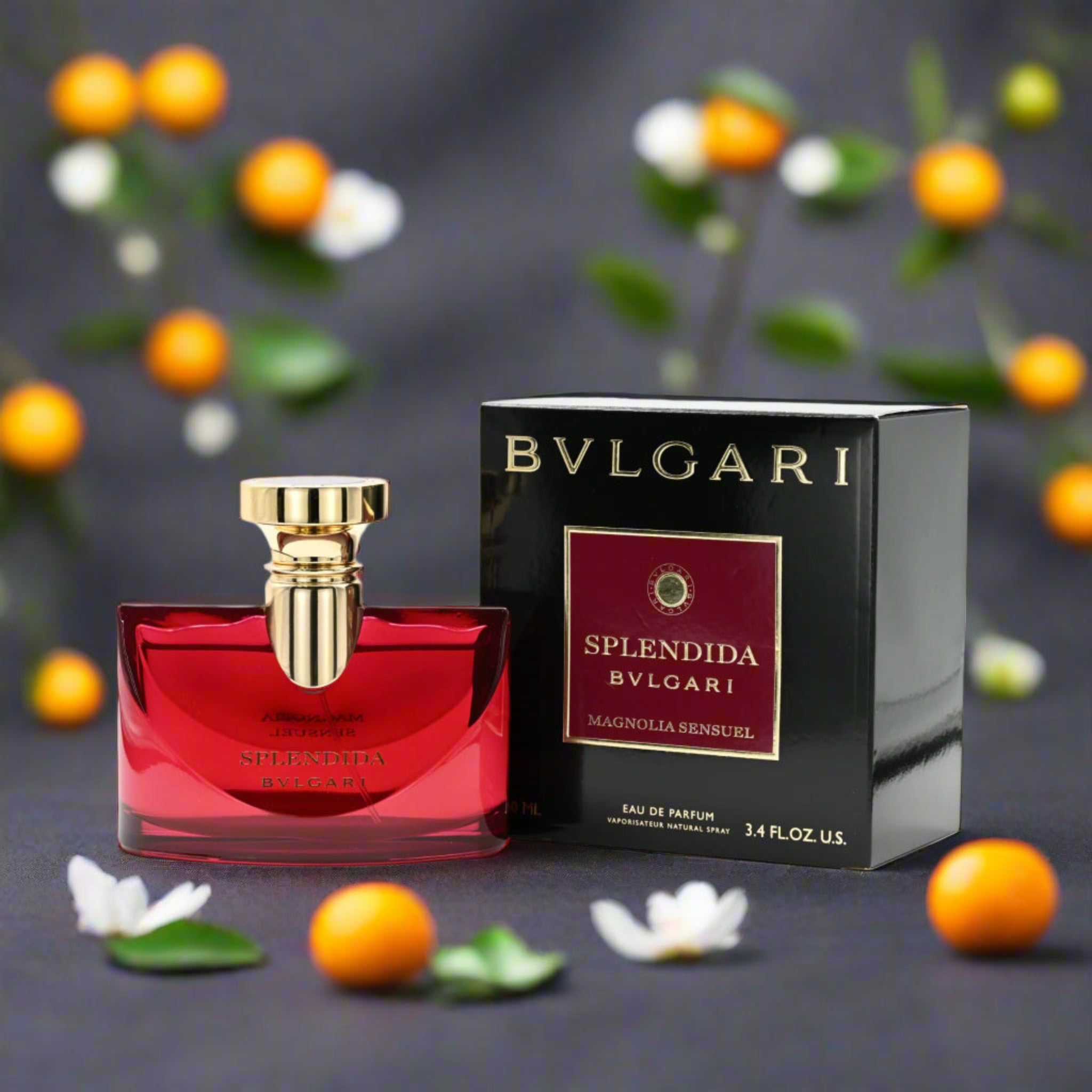 Bulgari Splendida perfume bottle and packaging with flowers and fruits in the background