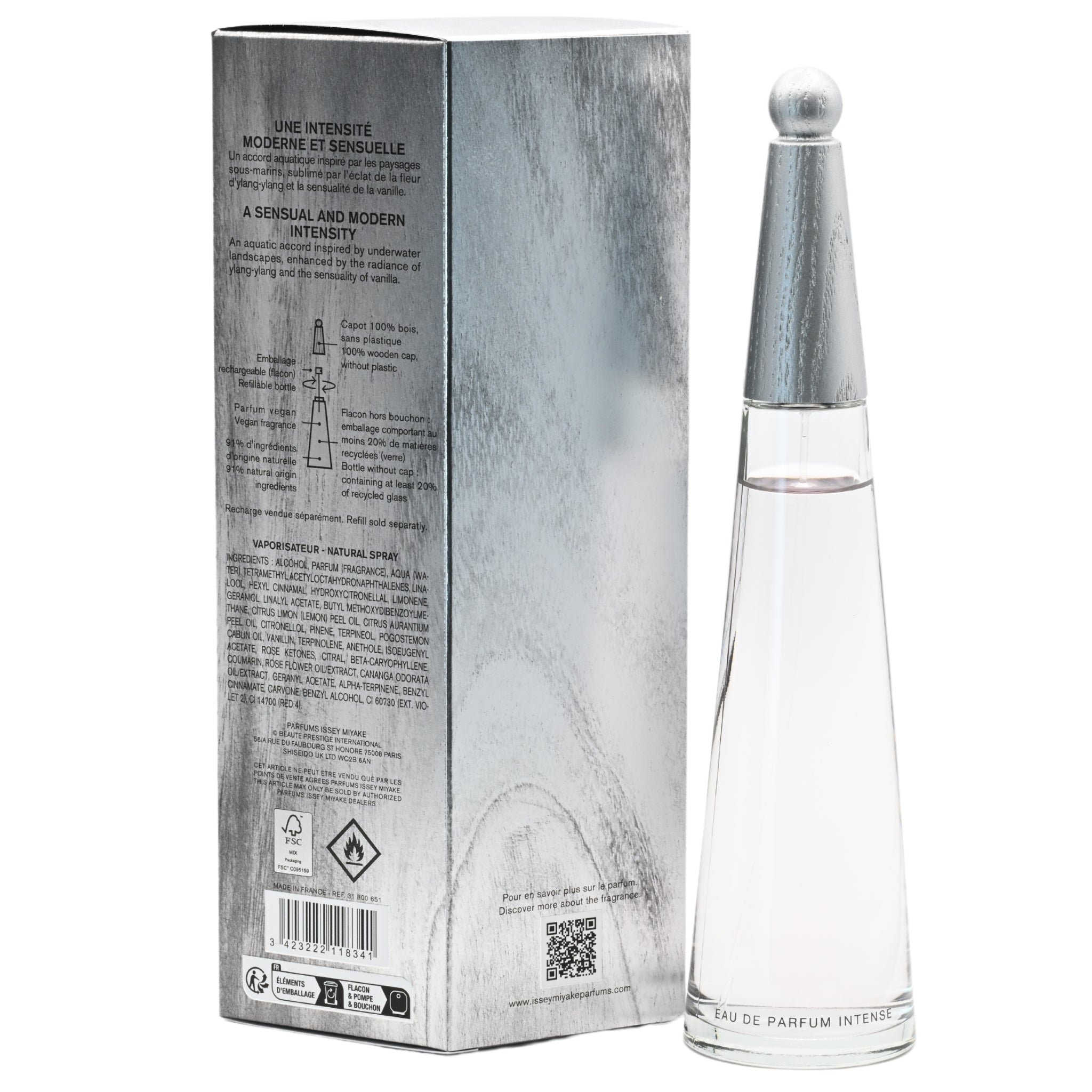 Perfume bottle with silver cap and packaging on a white background