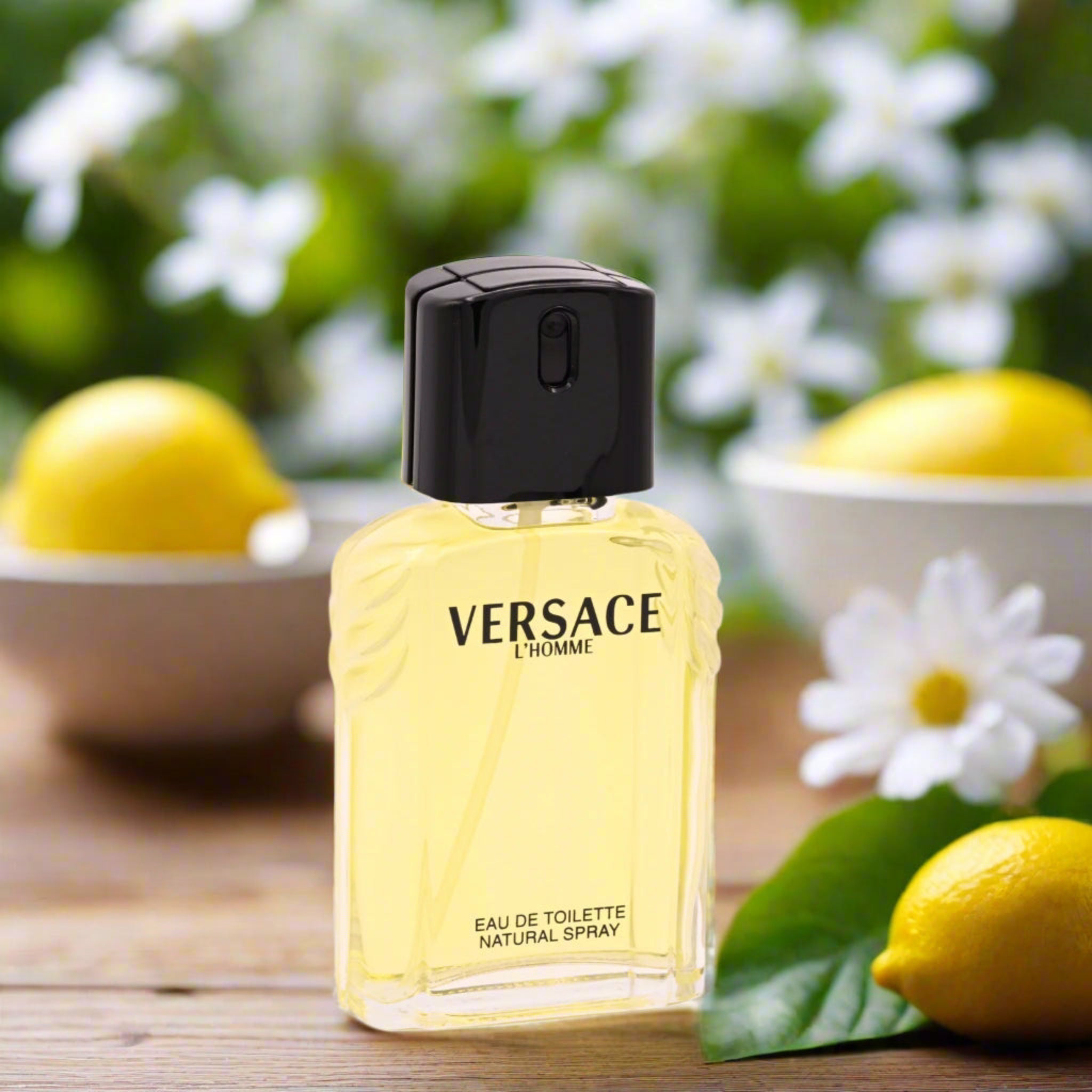 Versace L'Homme eau de toilette spray bottle on a white background