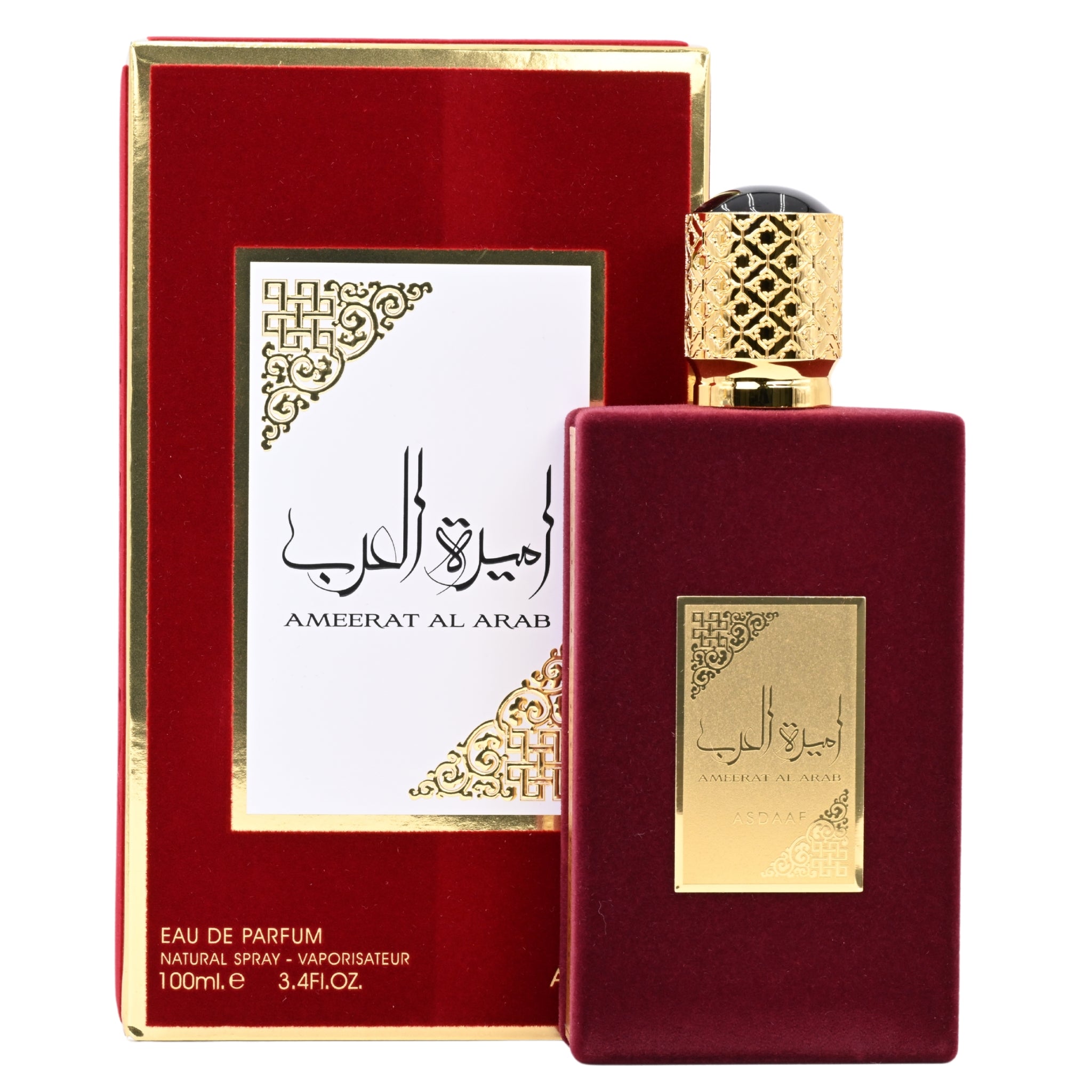Red and gold Ameerat Al Arab perfume bottle with packaging on a white background