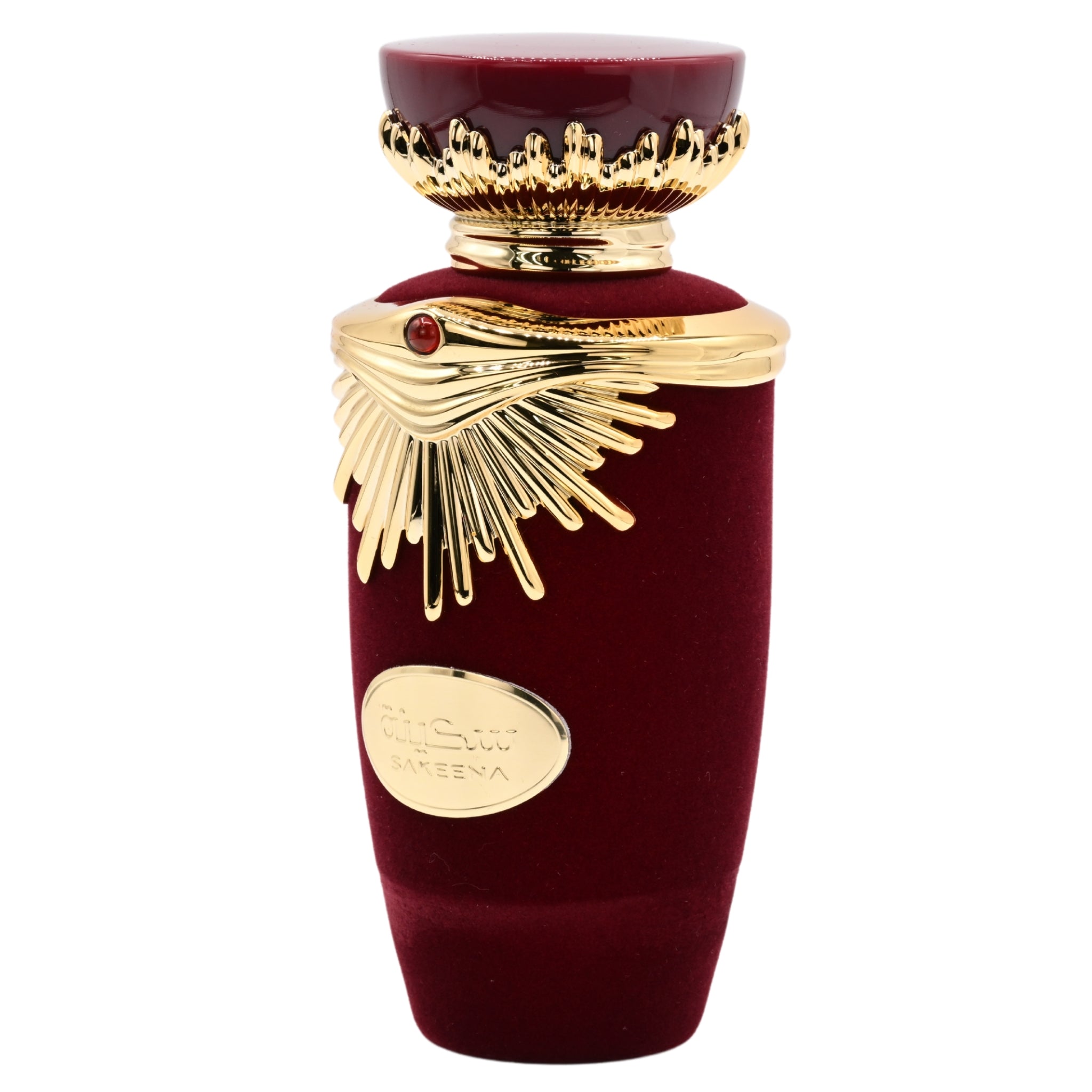 Red and gold perfume bottle with decorative elements on a white background