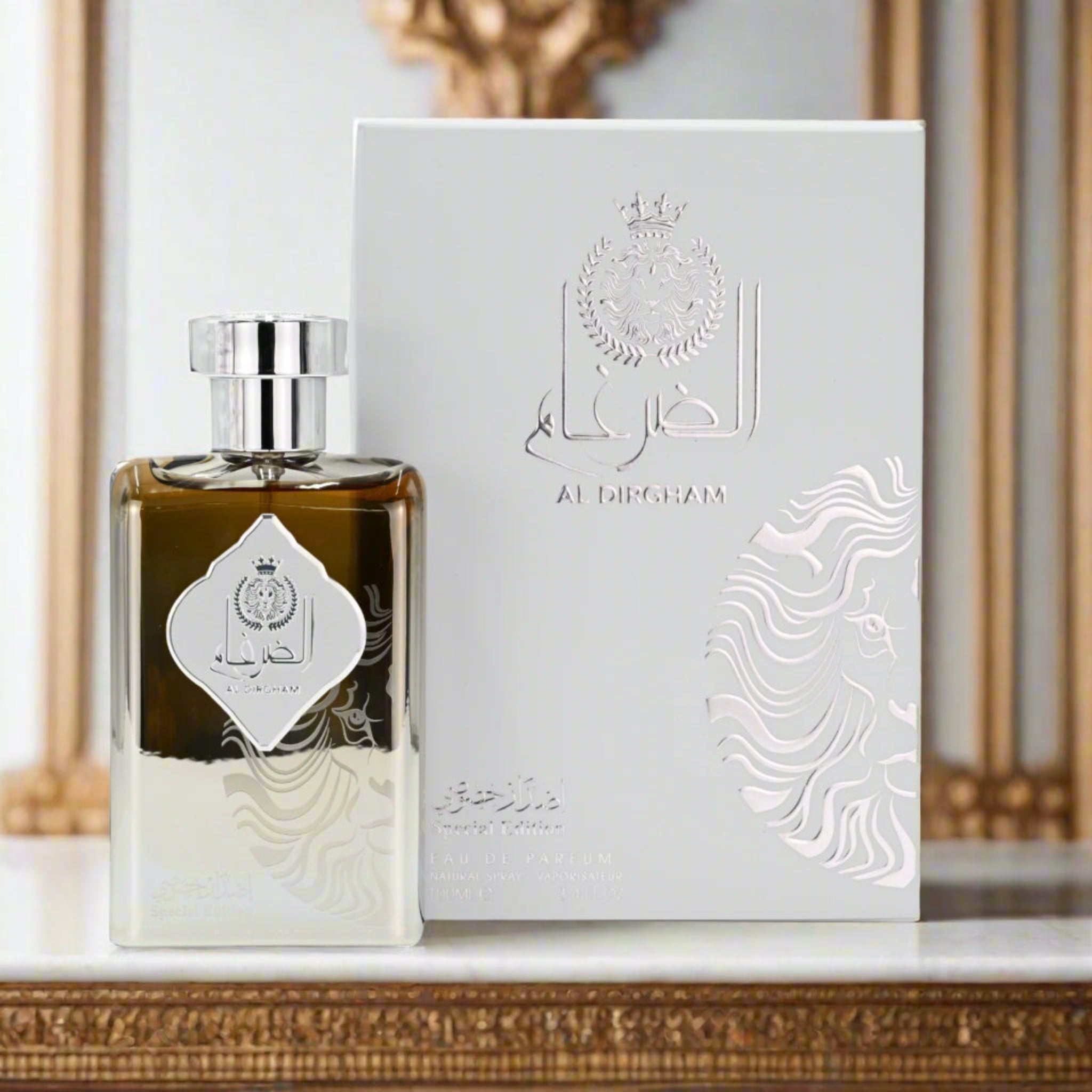 Perfume bottle and packaging with intricate design on a decorative background