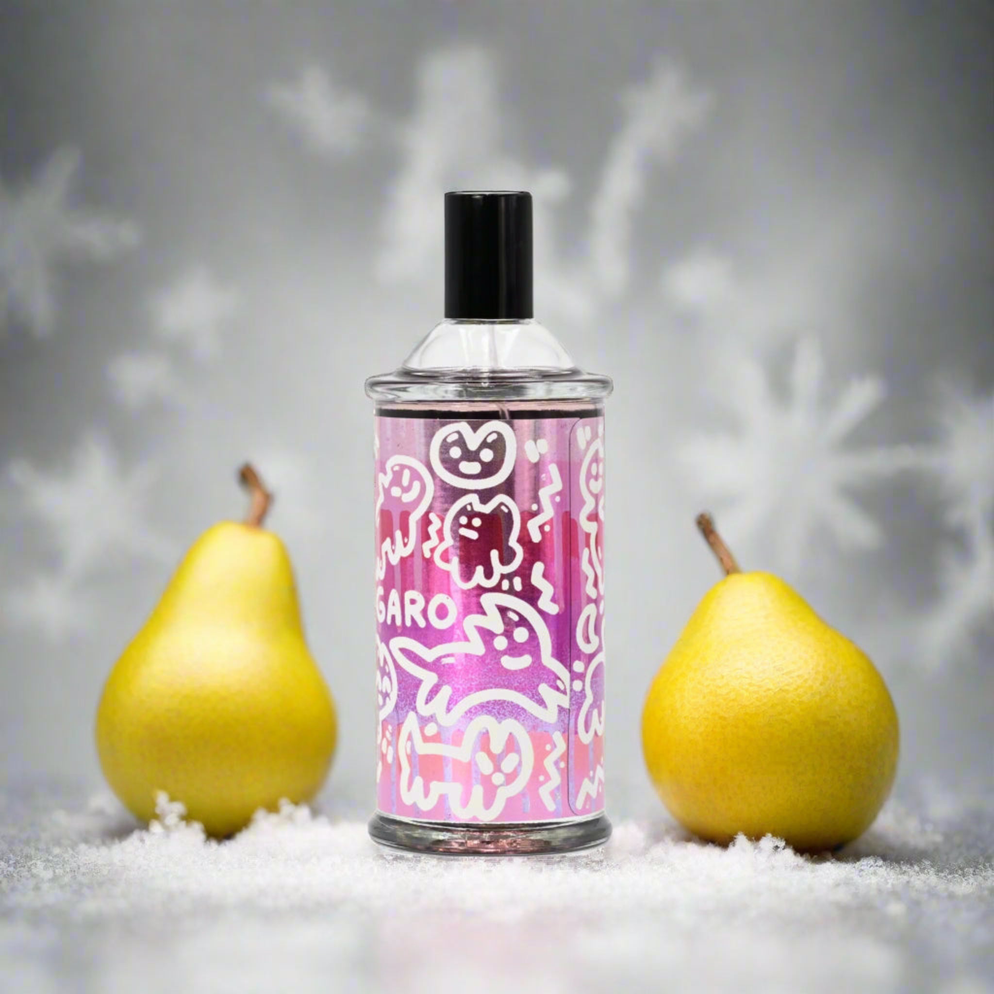 Bottle of perfume with two pears on a snowy background