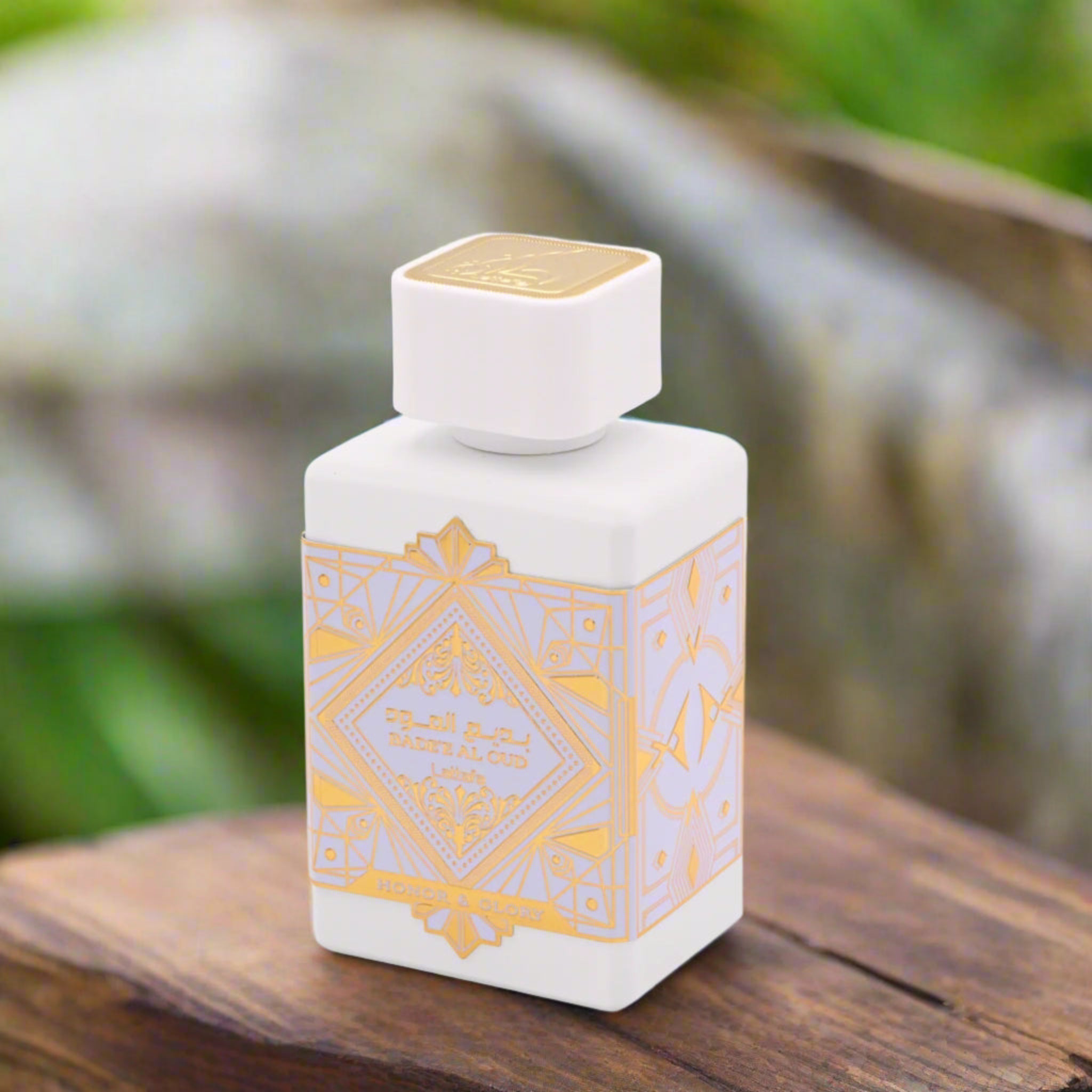 Decorative bottle with gold patterns on a wooden surface with a blurred natural background