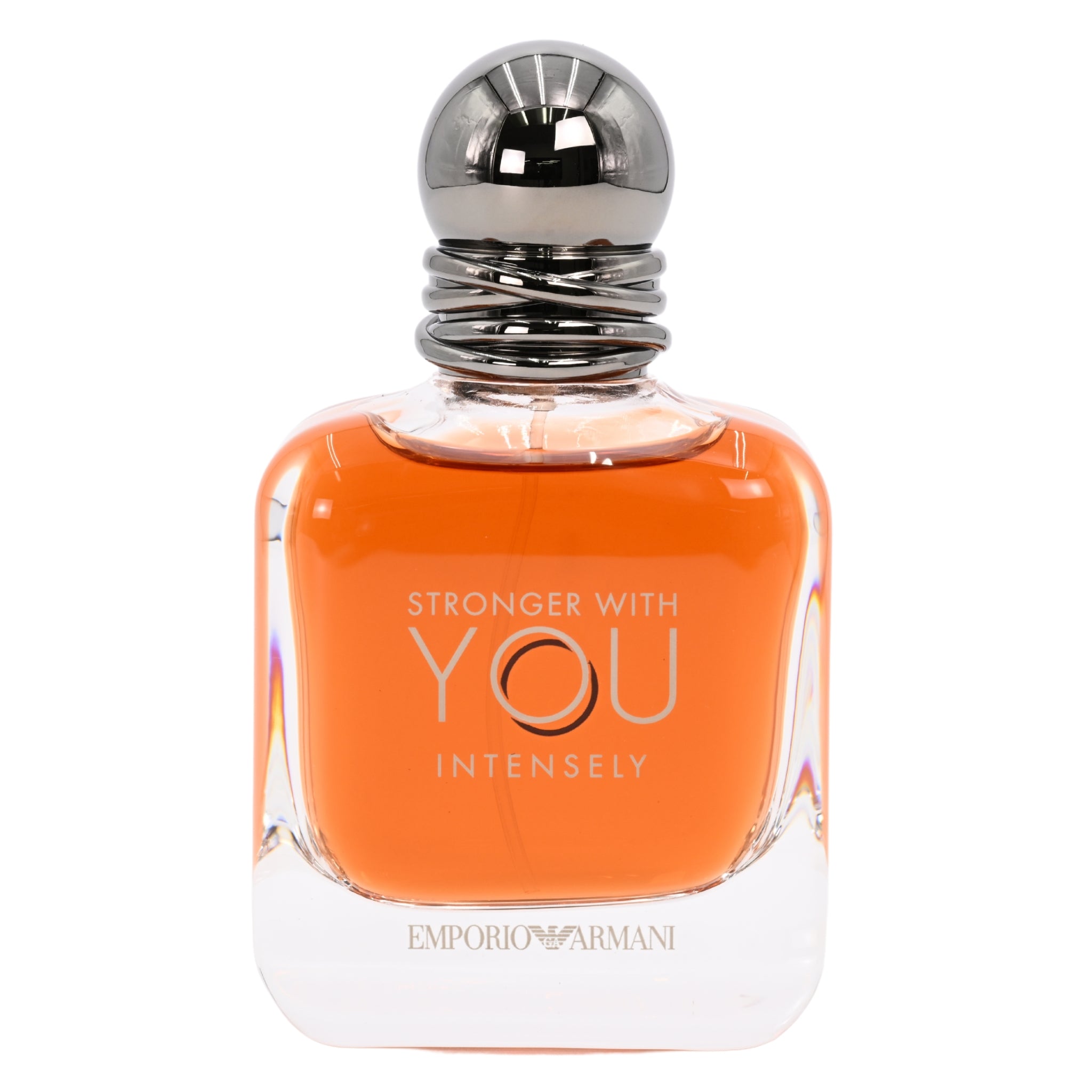 Orange perfume bottle with silver cap on a white background