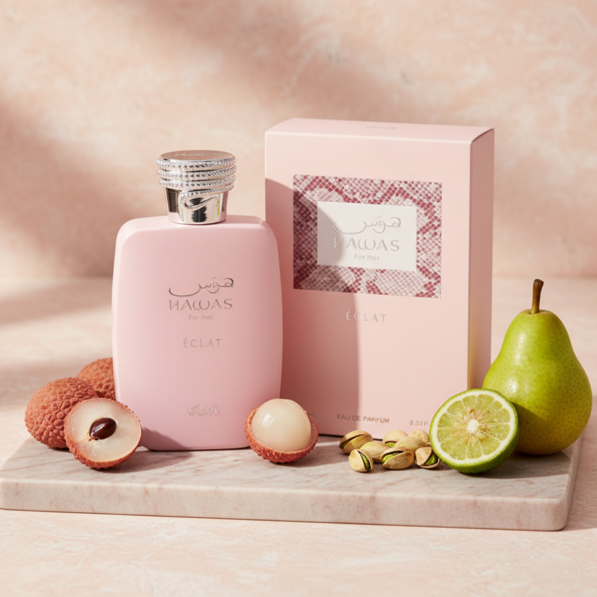 Pink HAWAS Eclat perfume bottle and packaging on a white background