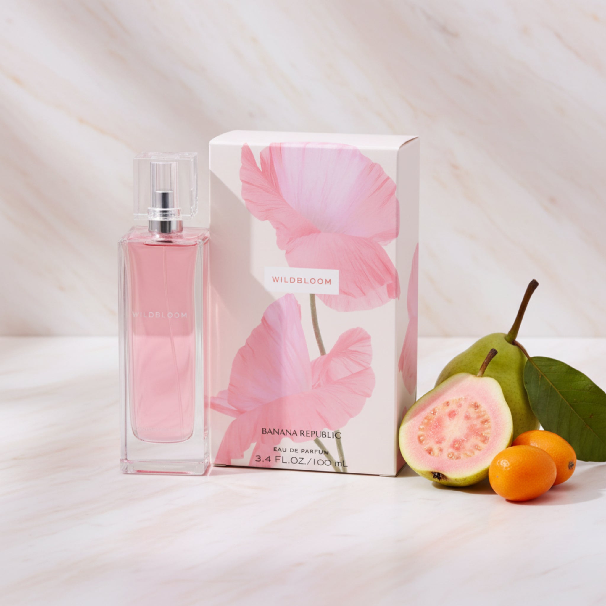 Pink Banana Republic Wildsloom perfume bottle and packaging on a white background