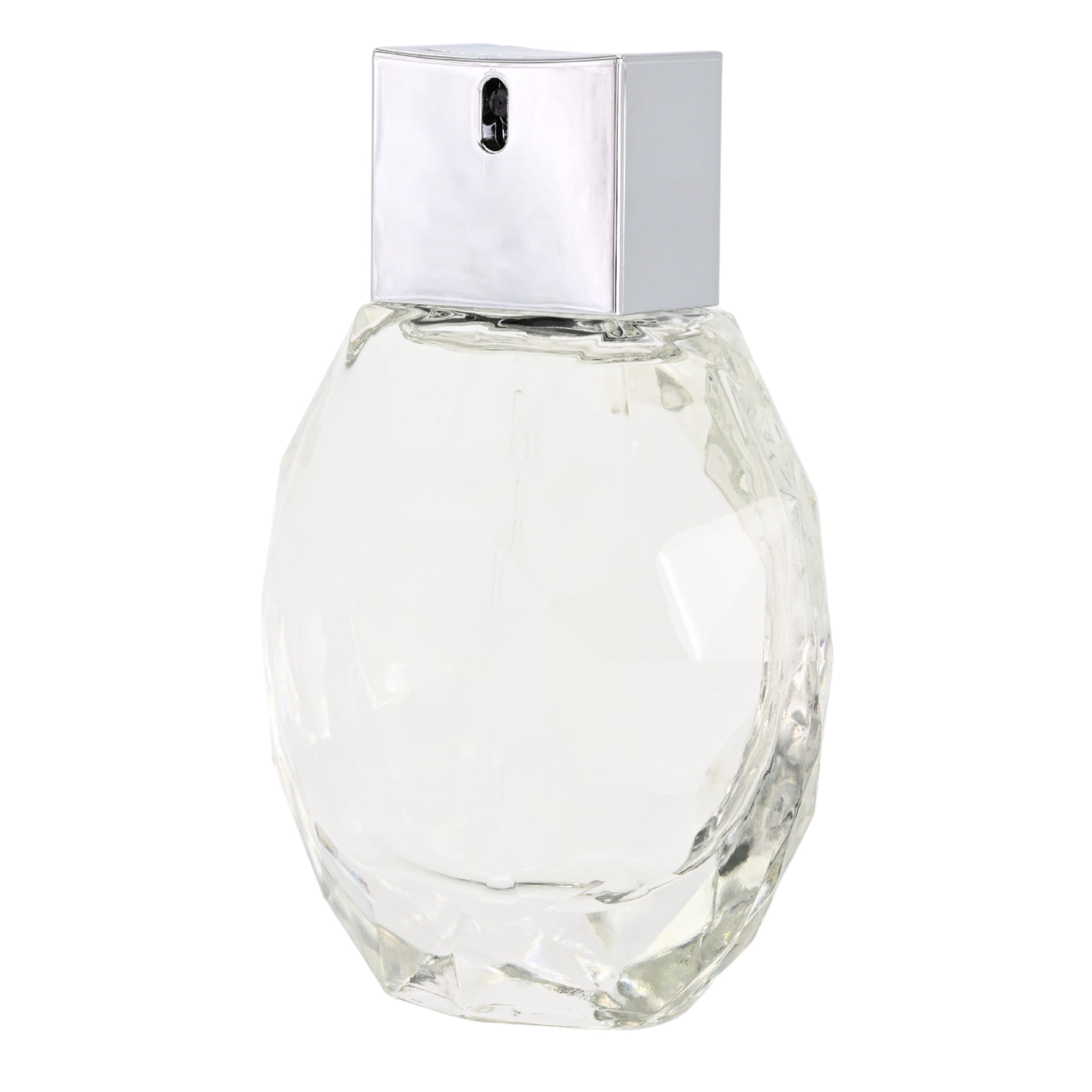 Clear glass perfume bottle with silver cap on a white background