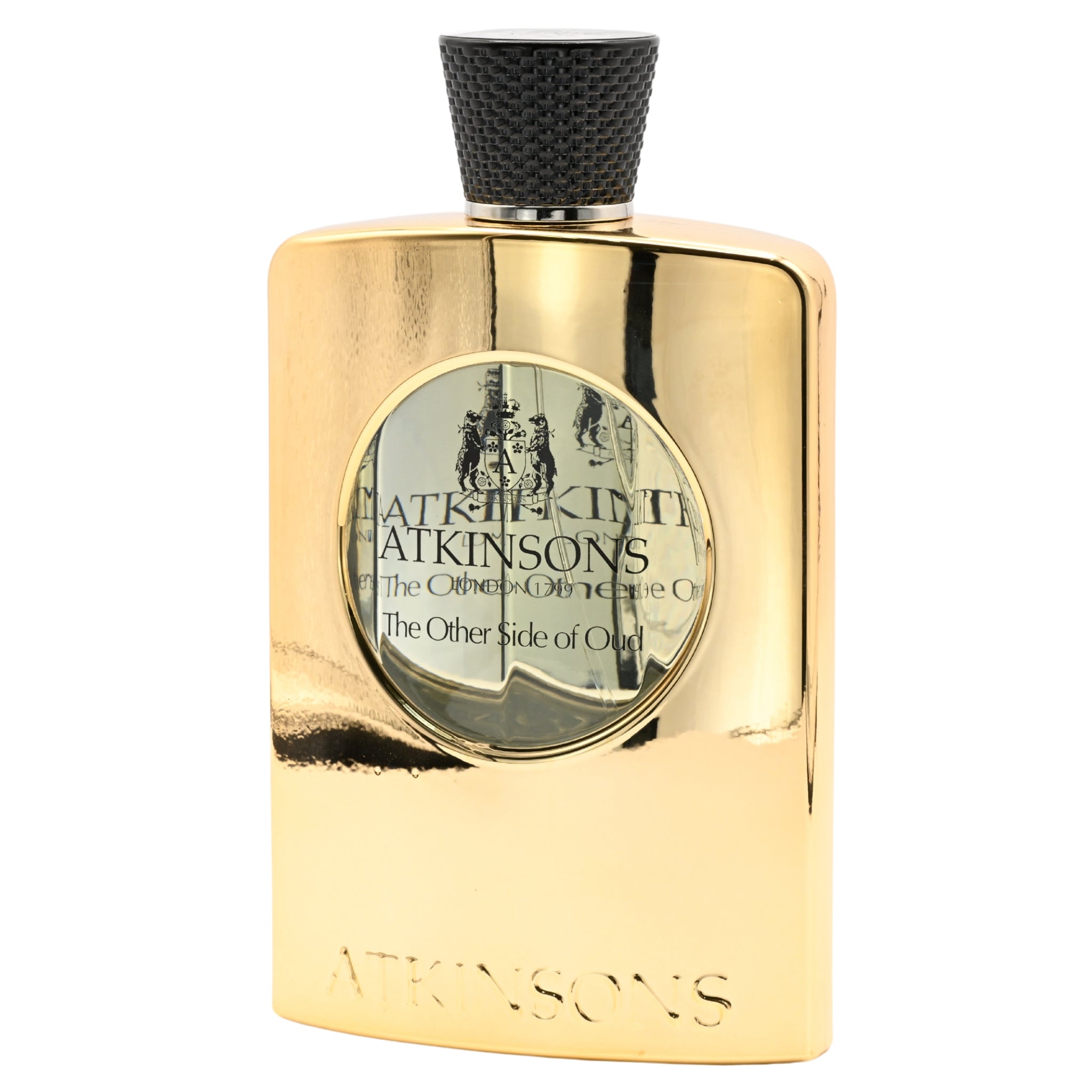 Gold Atkinsons perfume bottle on a white background
