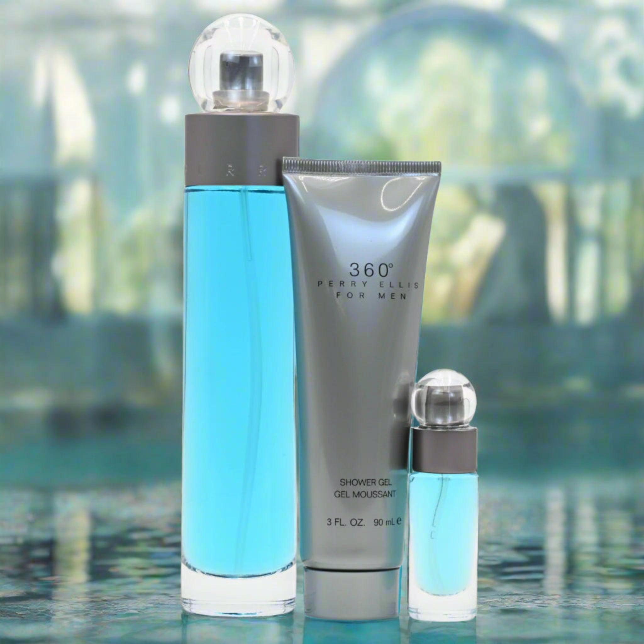 Perfume and shower gel set with '360' branding on a blurred water background