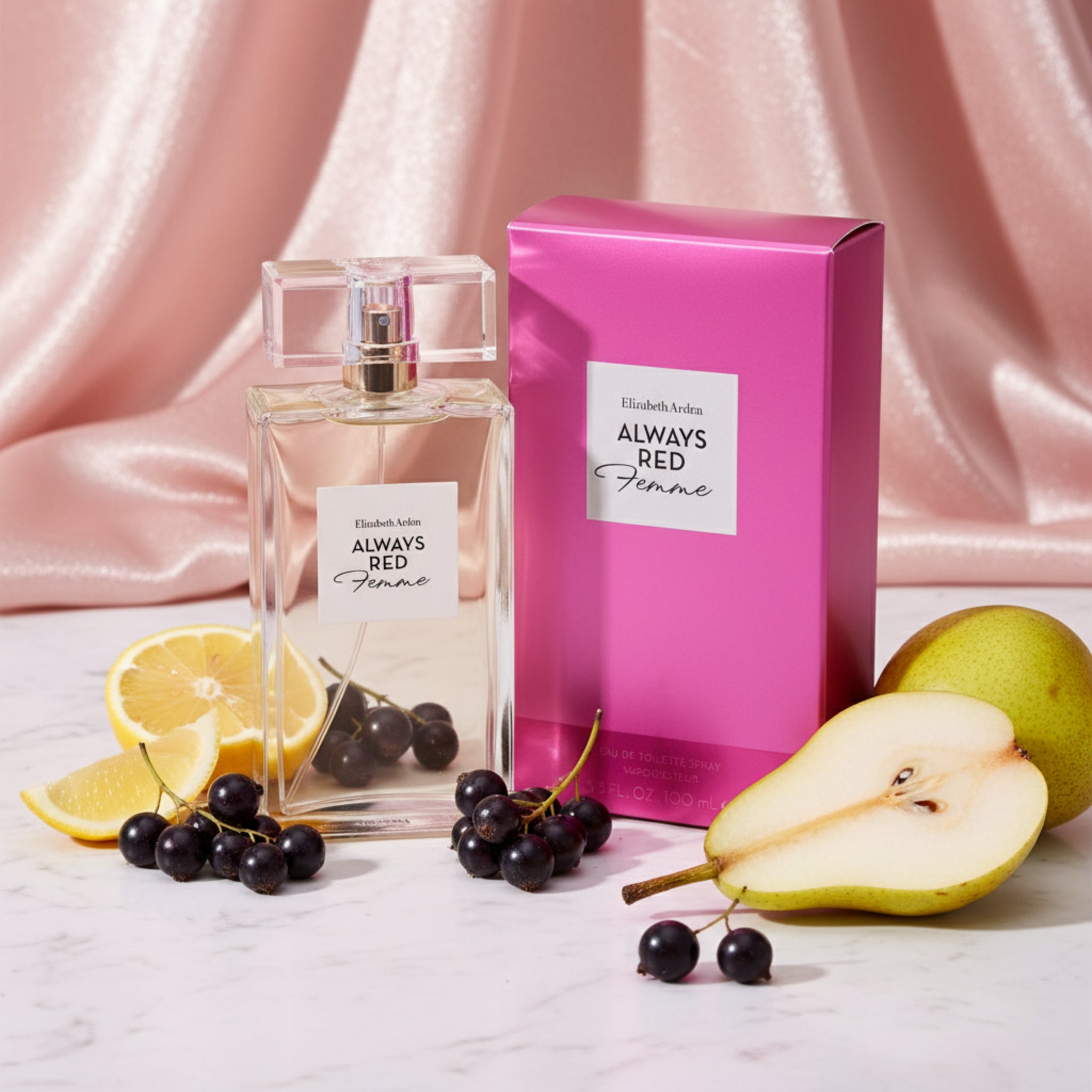 Elizabeth Arden Always Red Femme perfume bottle and pink packaging on a white background