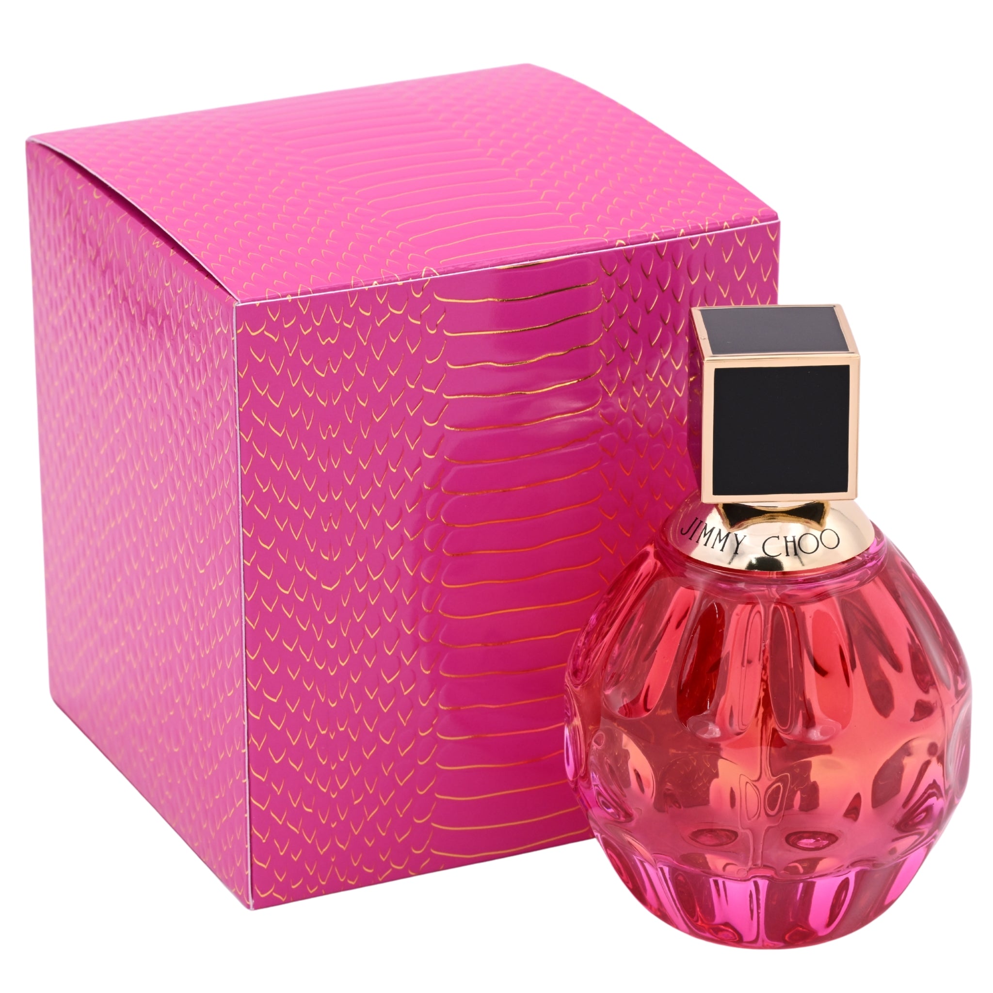Pink perfume bottle with gold cap and matching pink box on a white background