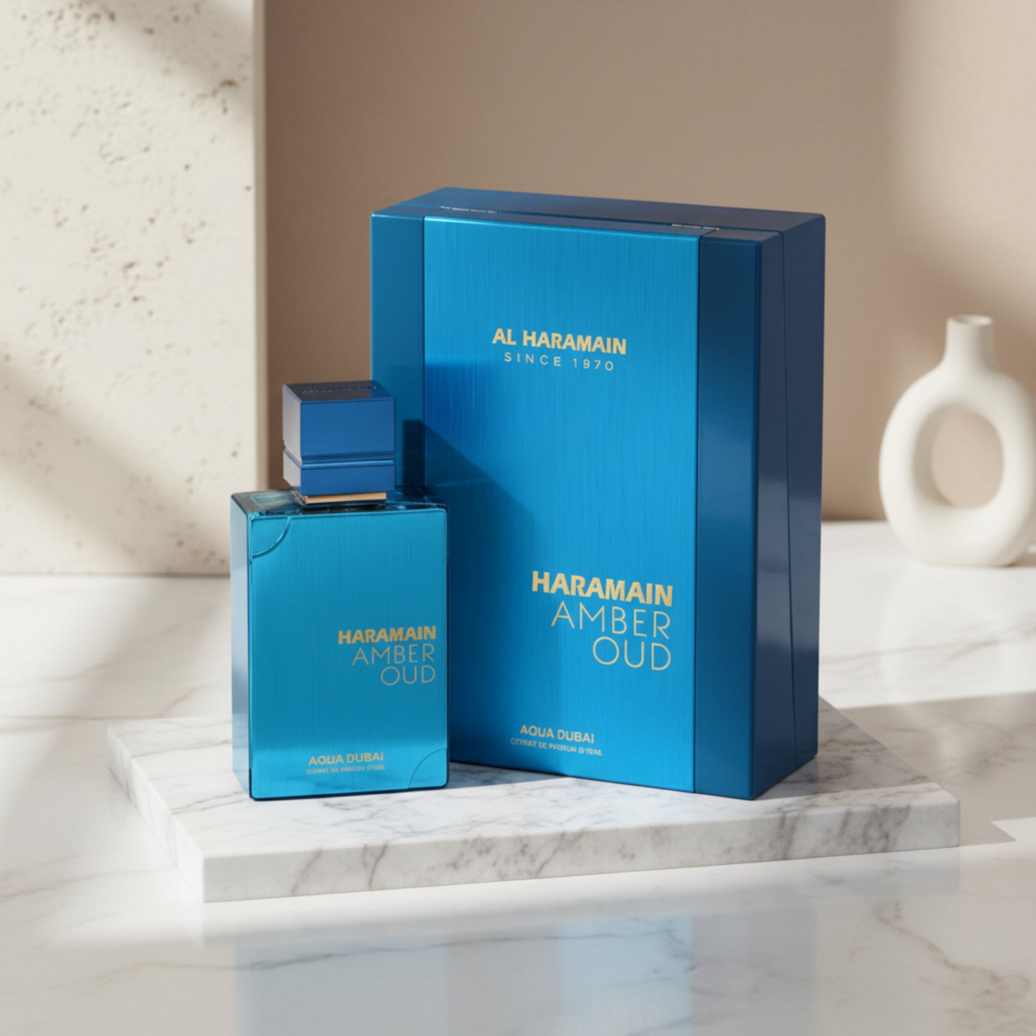Haramain Amber Oud perfume bottle and packaging on a white background