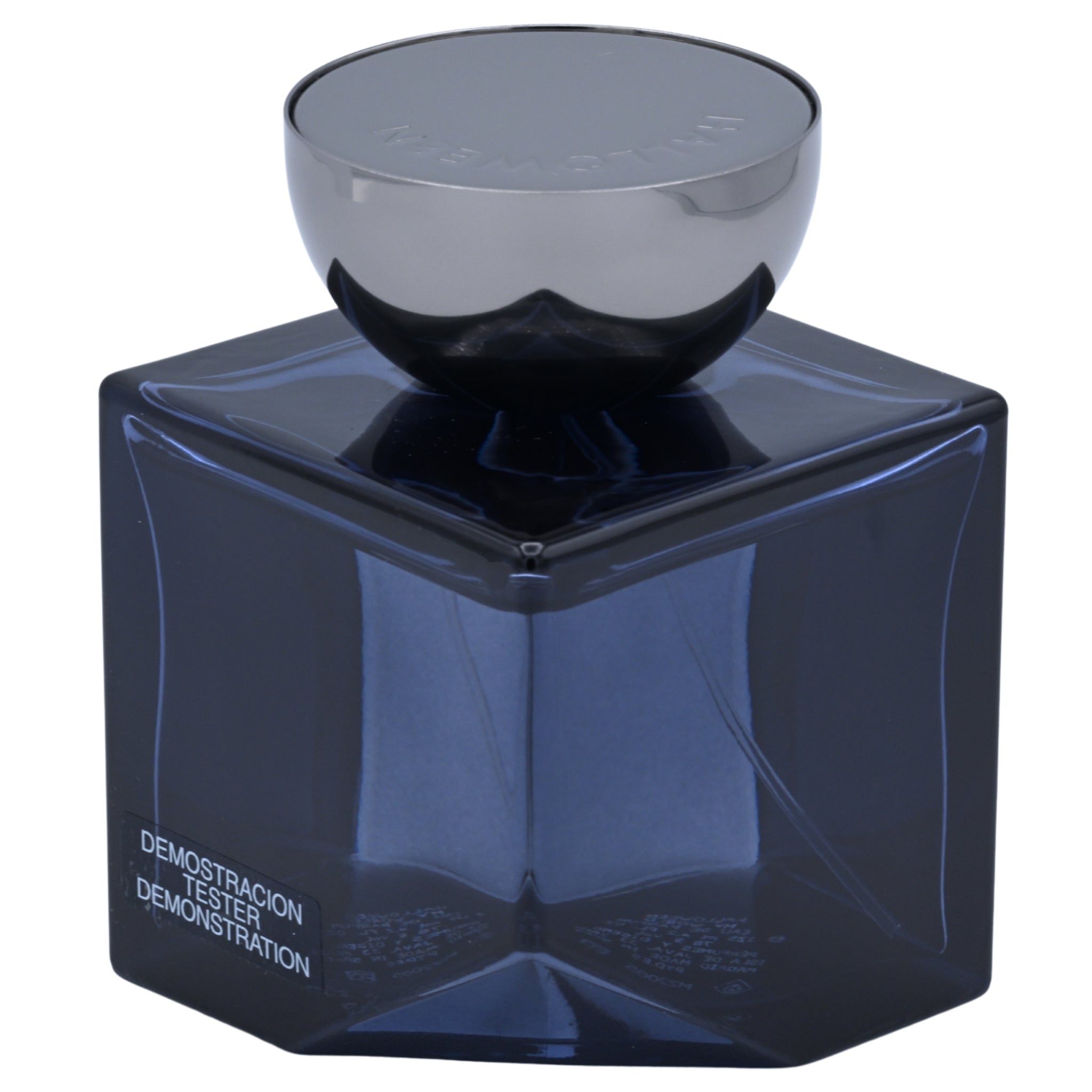 Dark blue perfume bottle with metallic cap on a white background