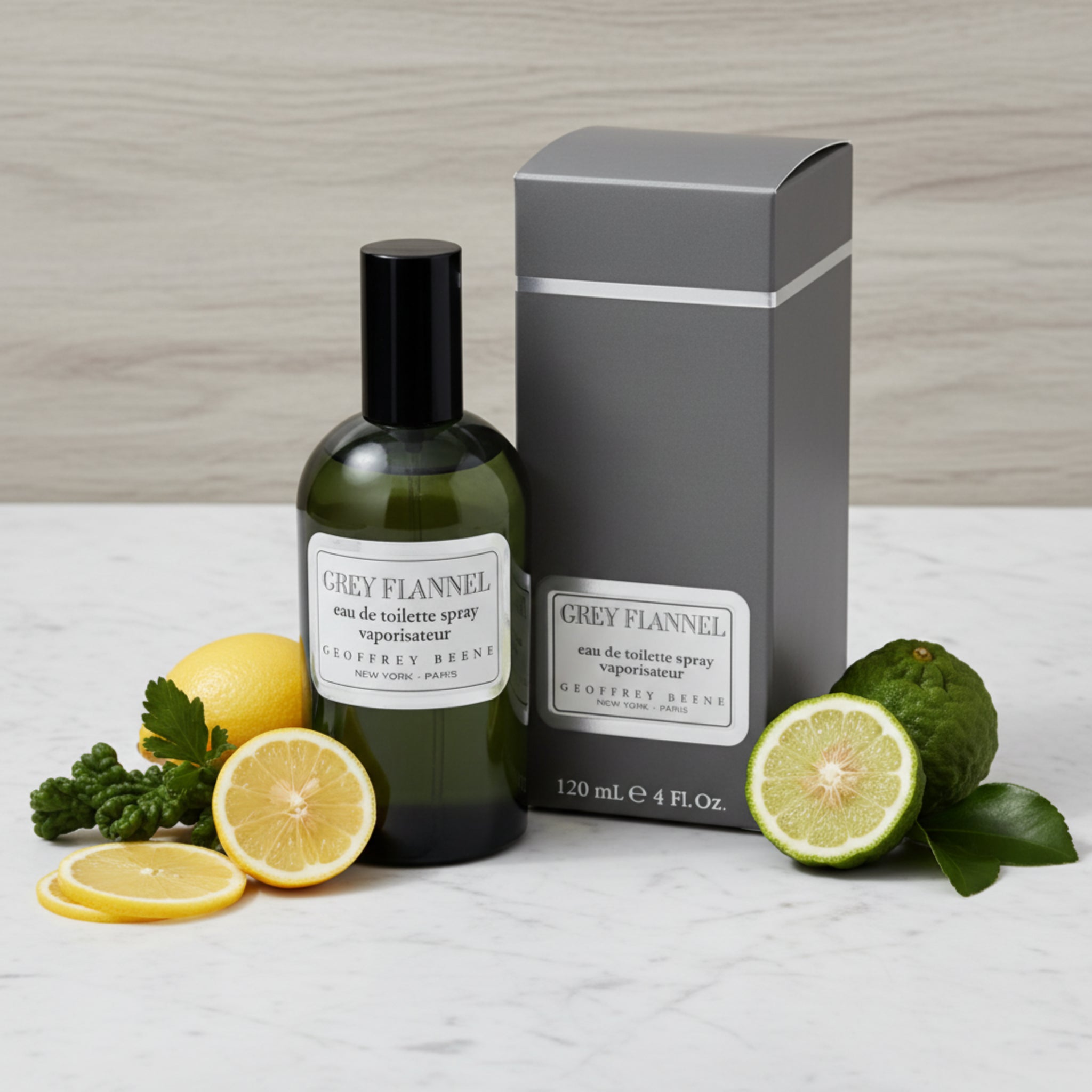 Perfume bottle and packaging of 'Grey Flannel' by Geoffrey Beene on a white background