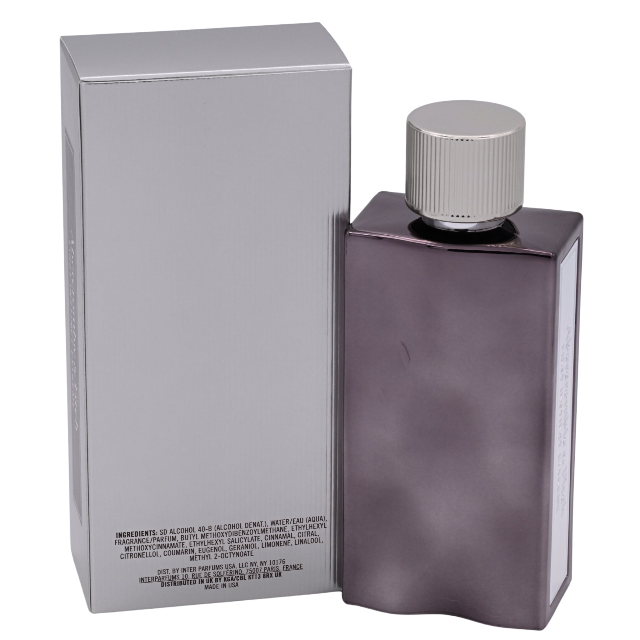 Perfume bottle with silver cap and packaging on a white background