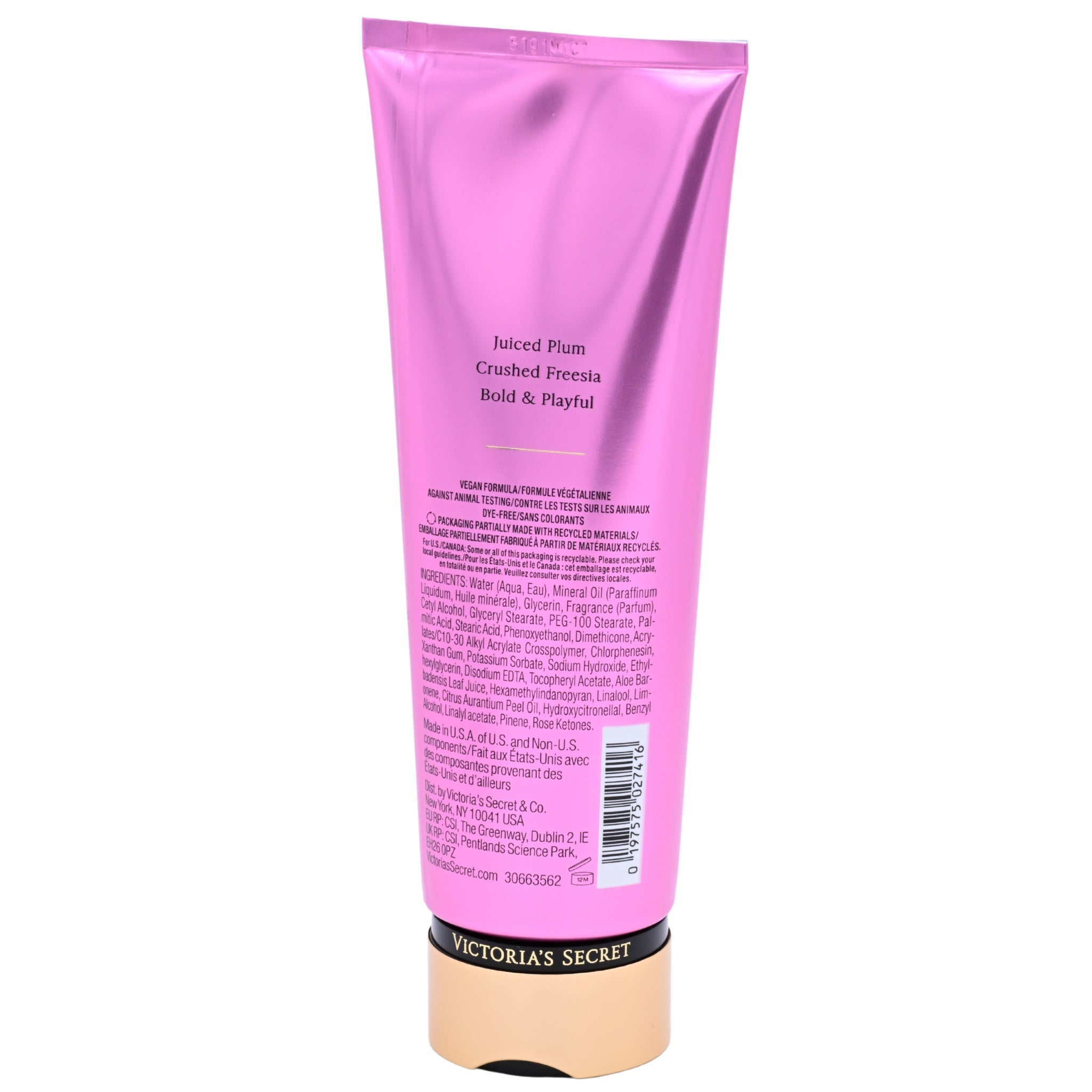 Pink tube of Victoria's Secret body lotion on a white background