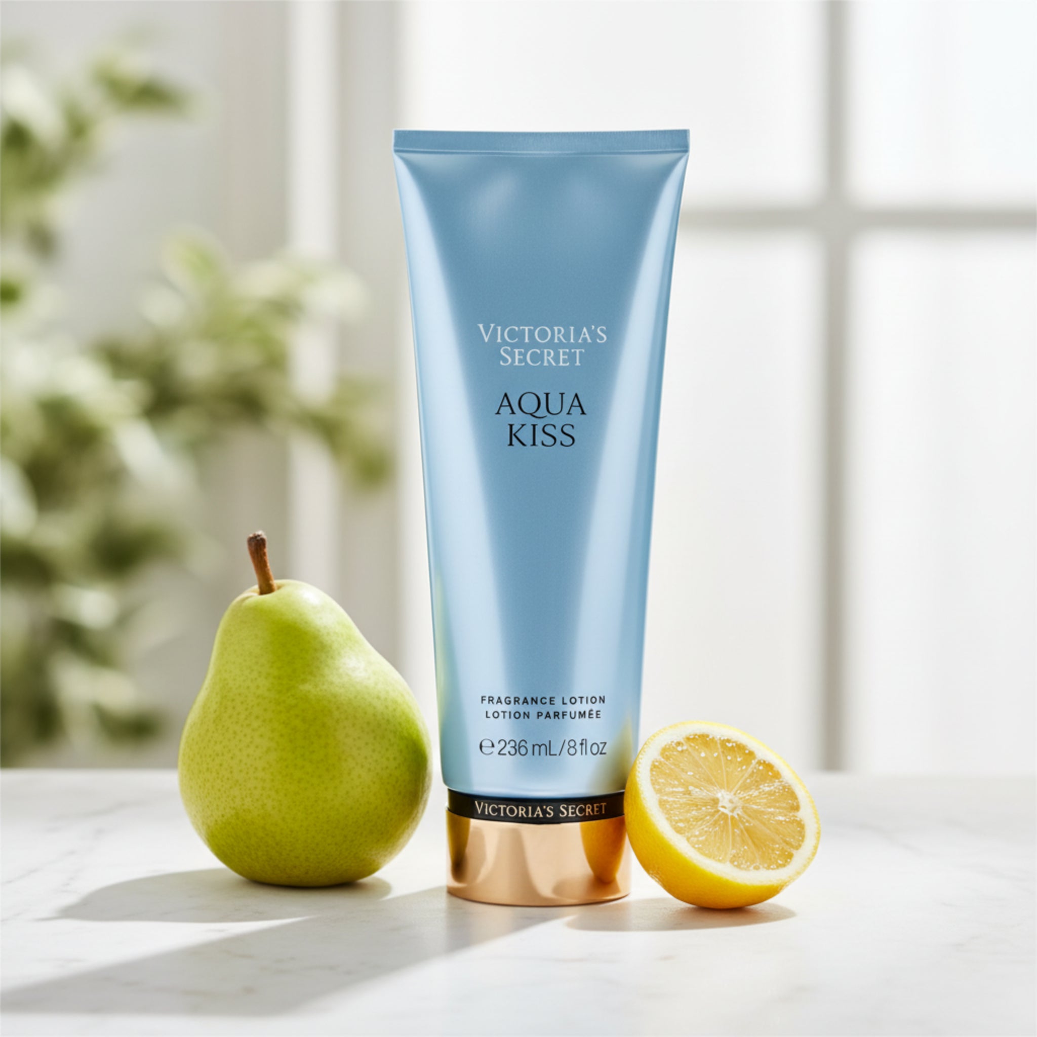 Victoria's Secret Aqua Kiss fragrance lotion on a white background